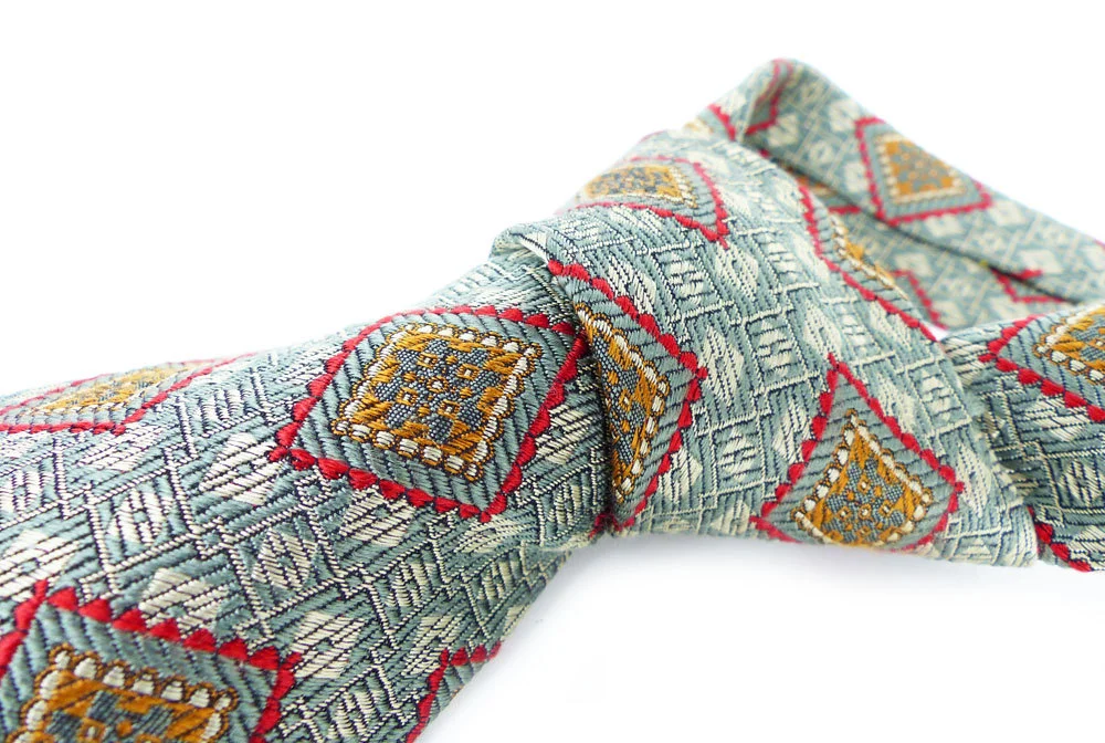woven silk necktie in a elegant and traditional pattern. Money green,