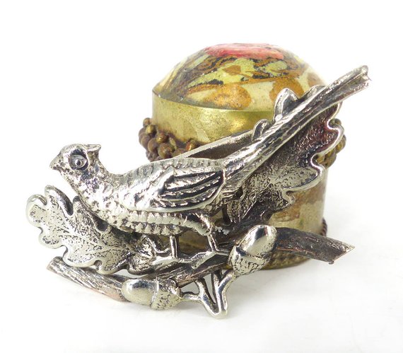 Antiqued silver pheasant on a branch lapel pin or brooch