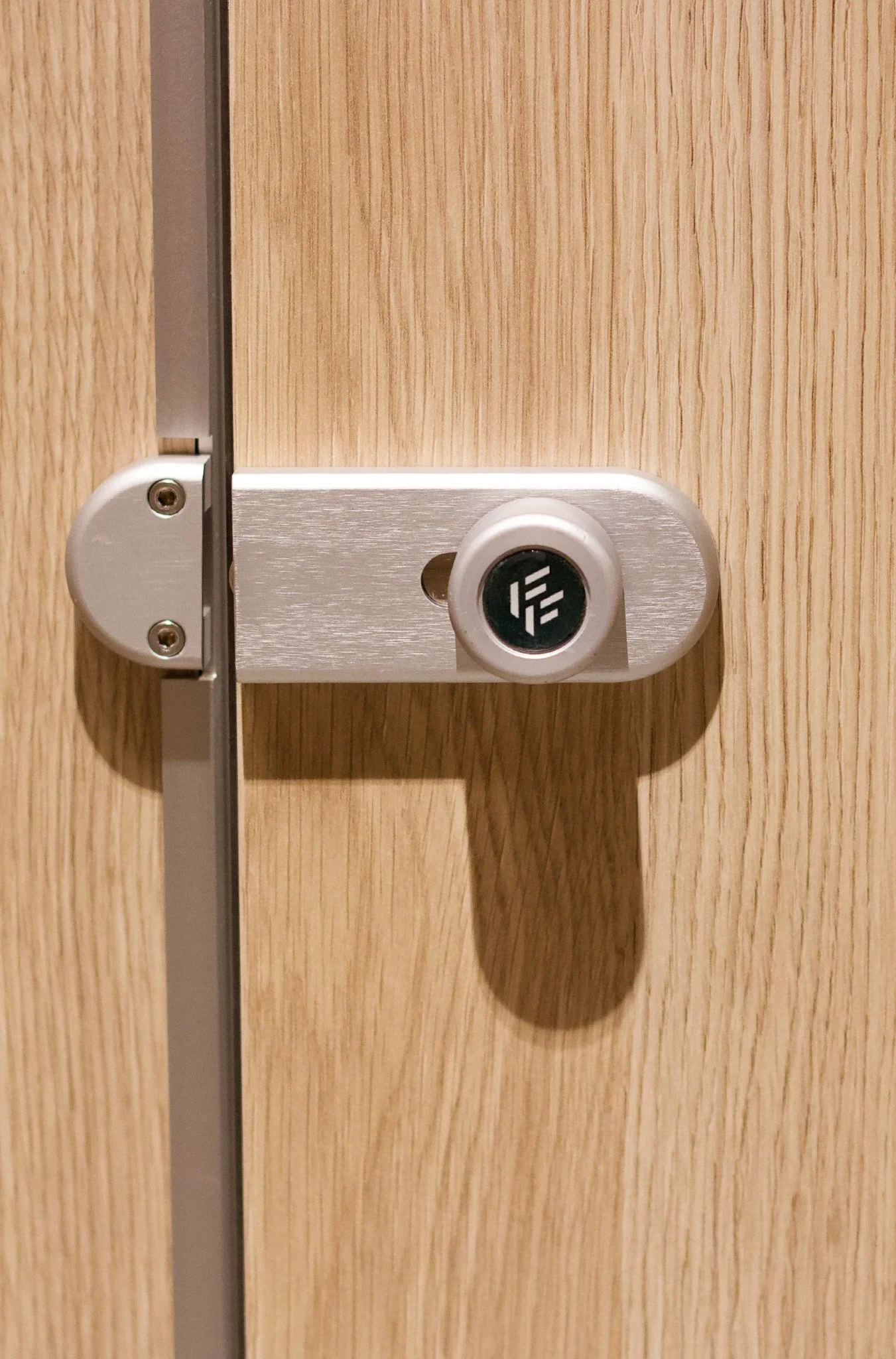 Freeform Toilet Cubicle Lock from the outside with the FF logo