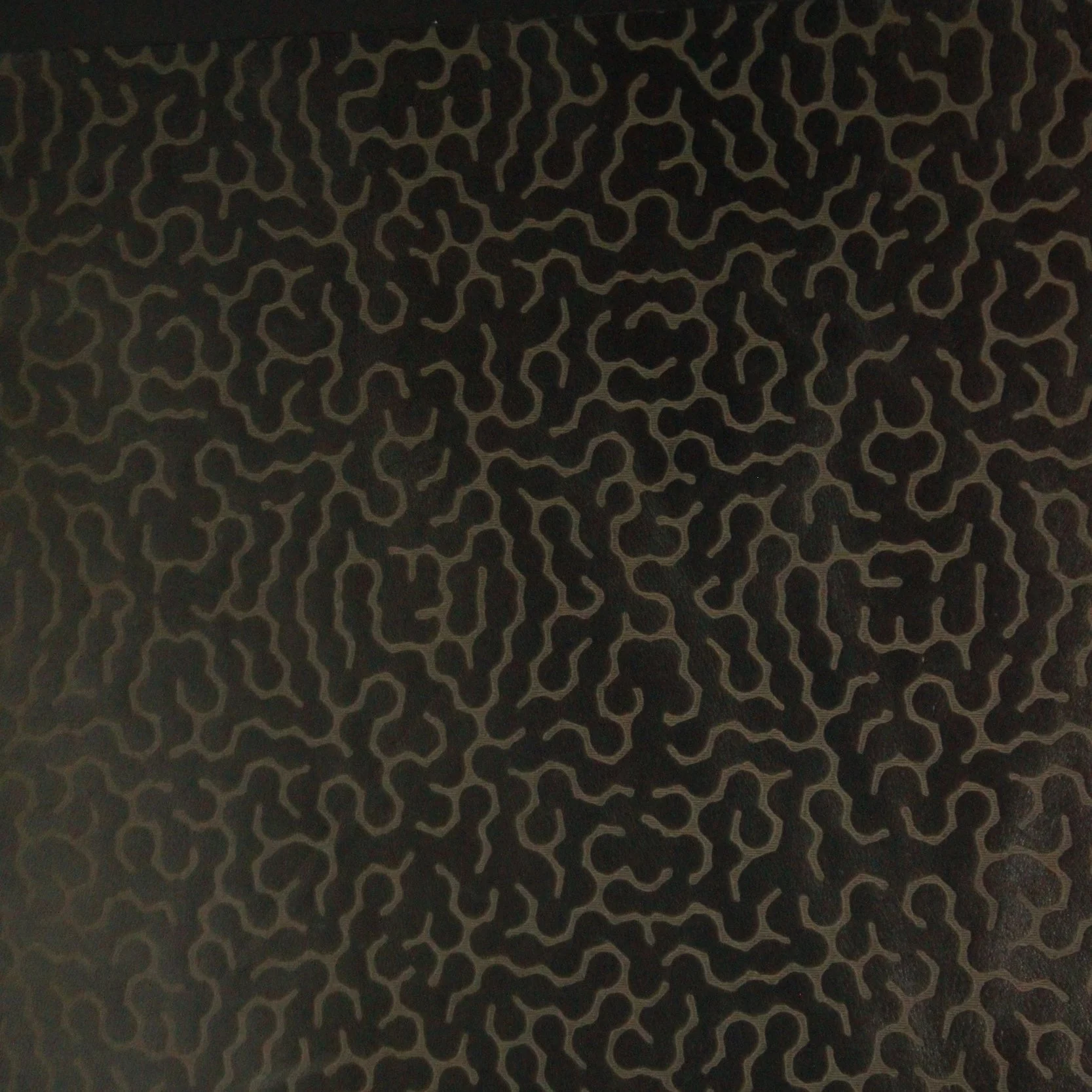 engraved  on Maude leather in licorice