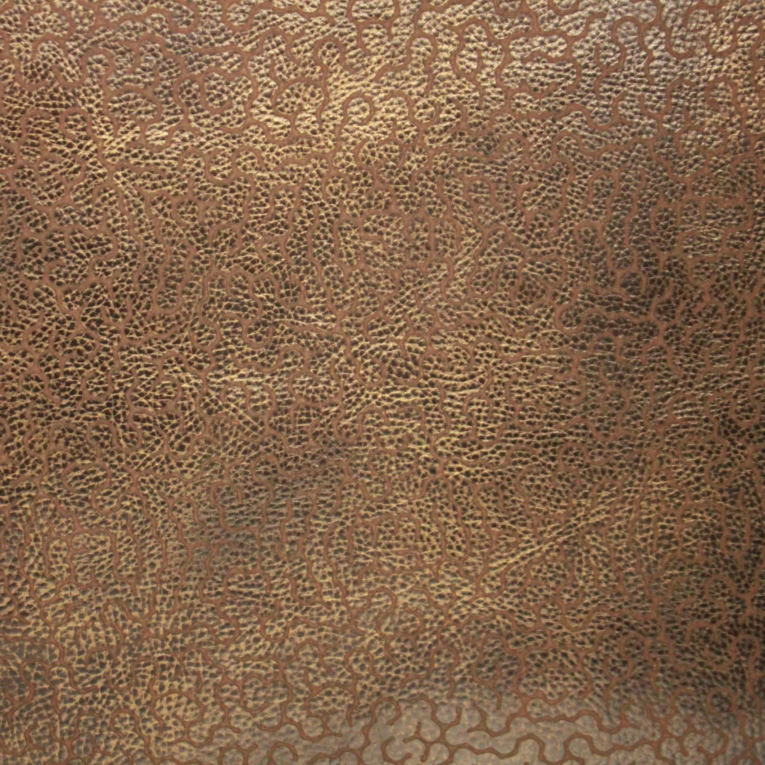 engraved with mondo  hand-painted bronze on ascot leather in phaorah