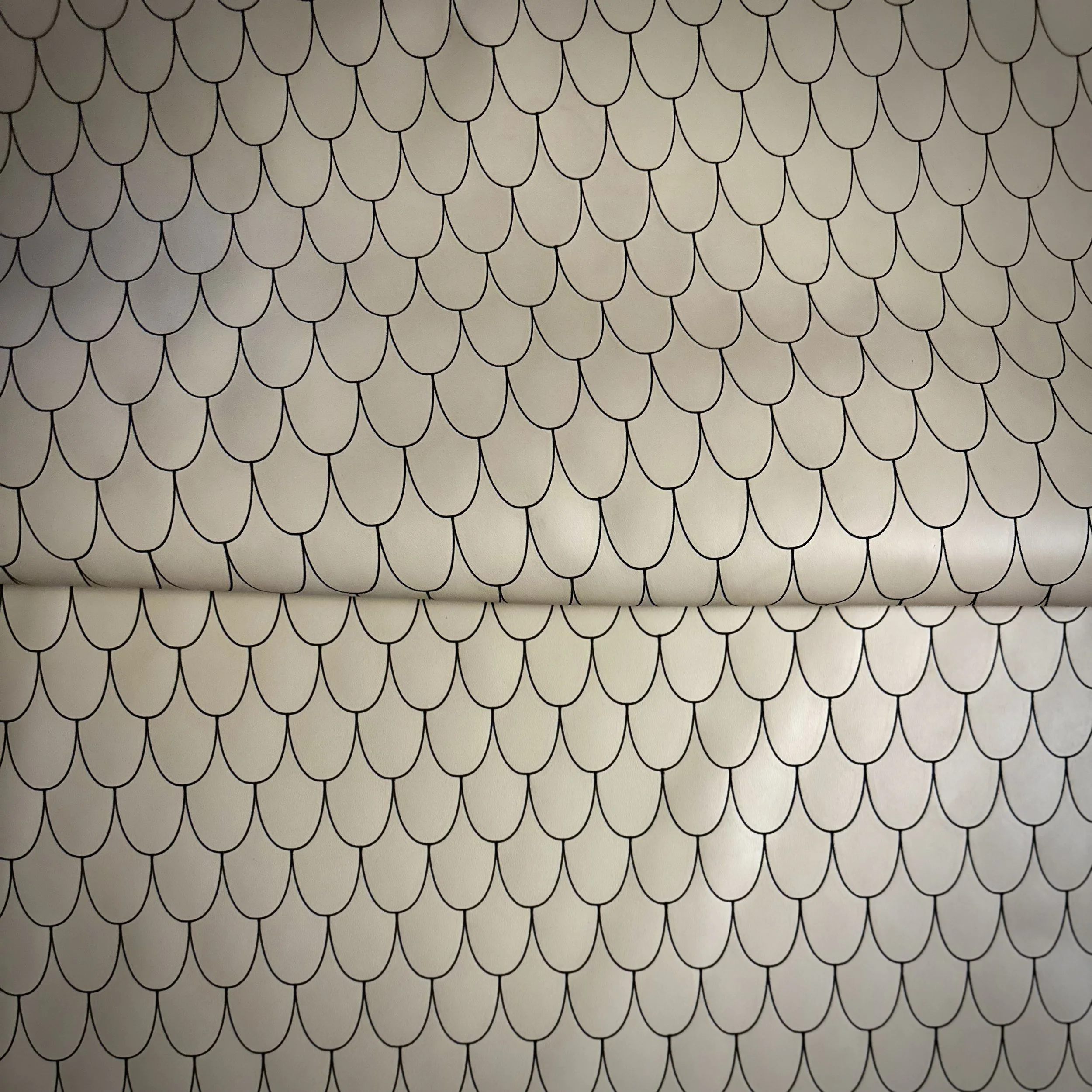 etched on Maude leather in color oyster