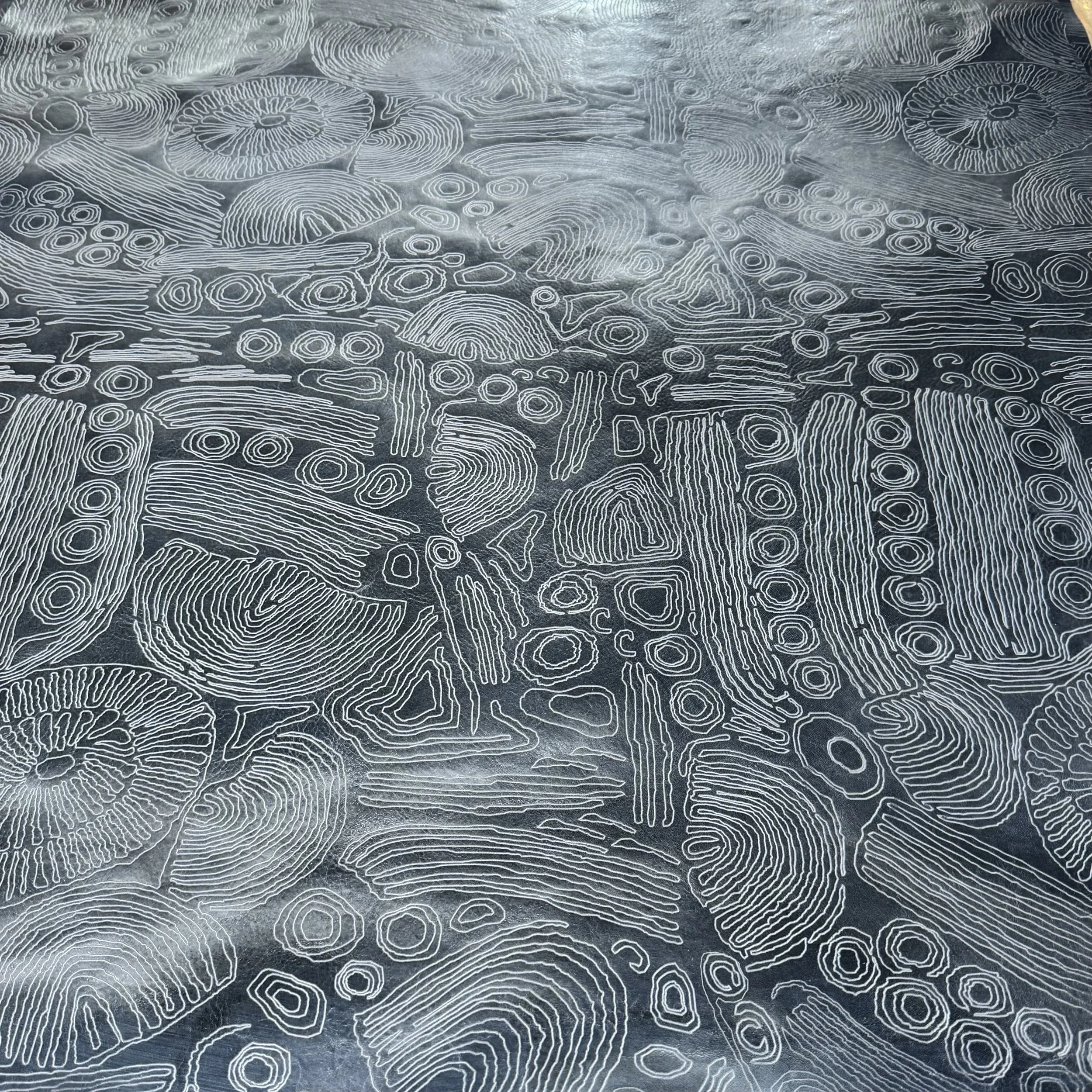 etched on ascot leather in color sea biscuit with white wash