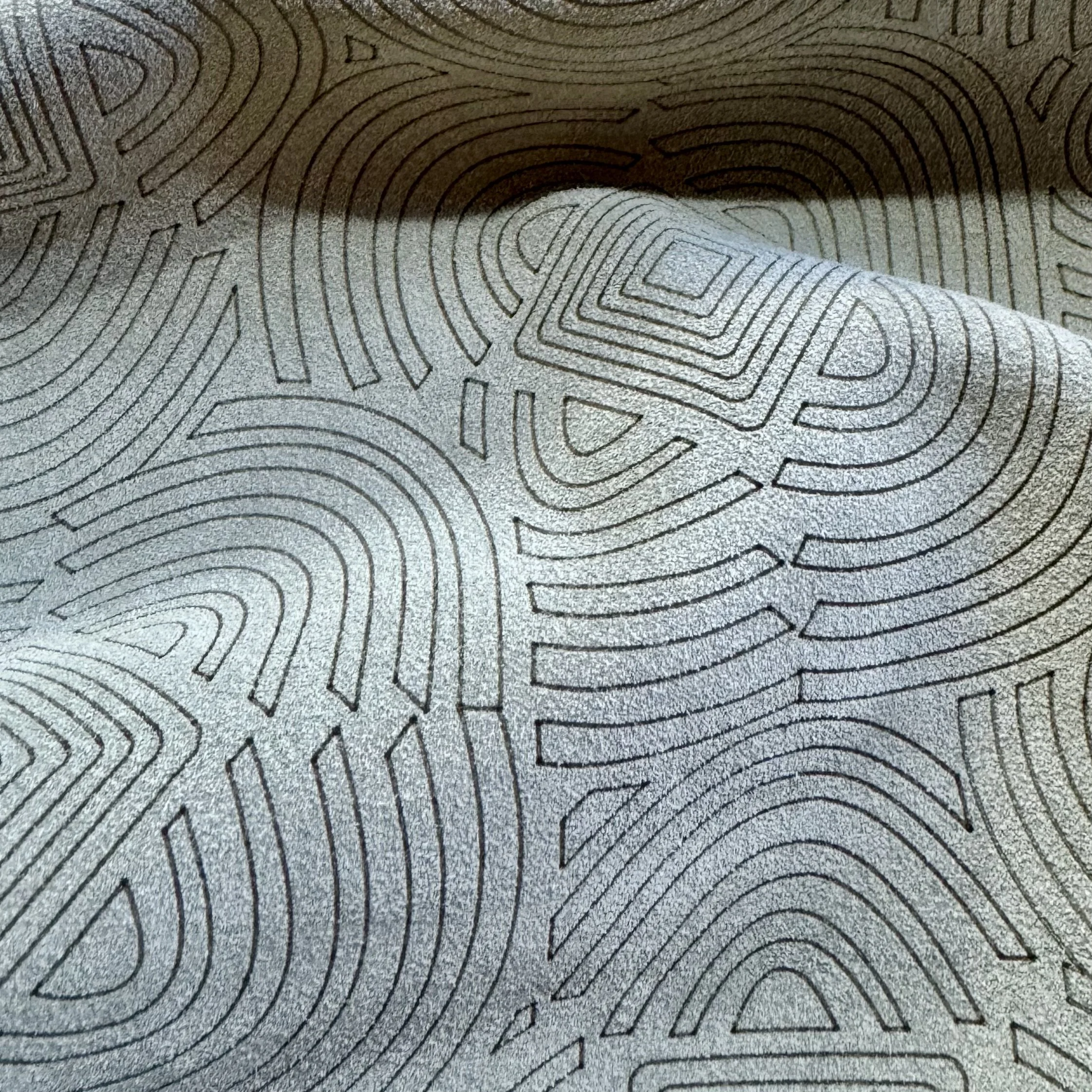 etched on Rutherford suede in color lichen
