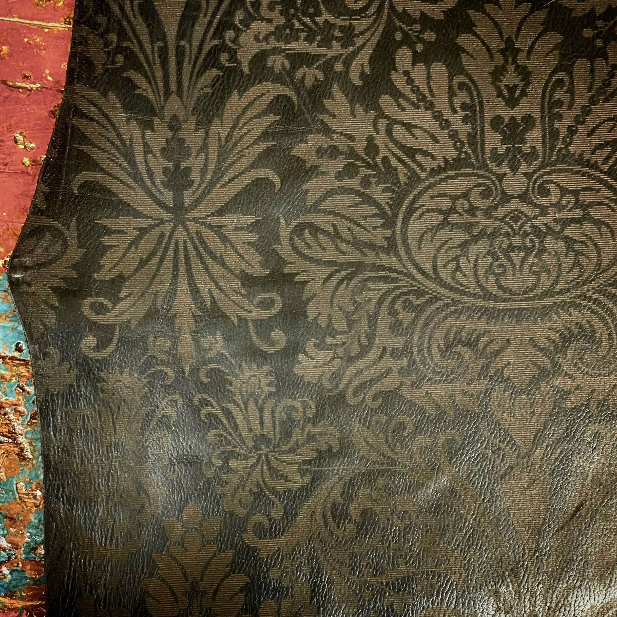 engraved on black vegetable tanned leather