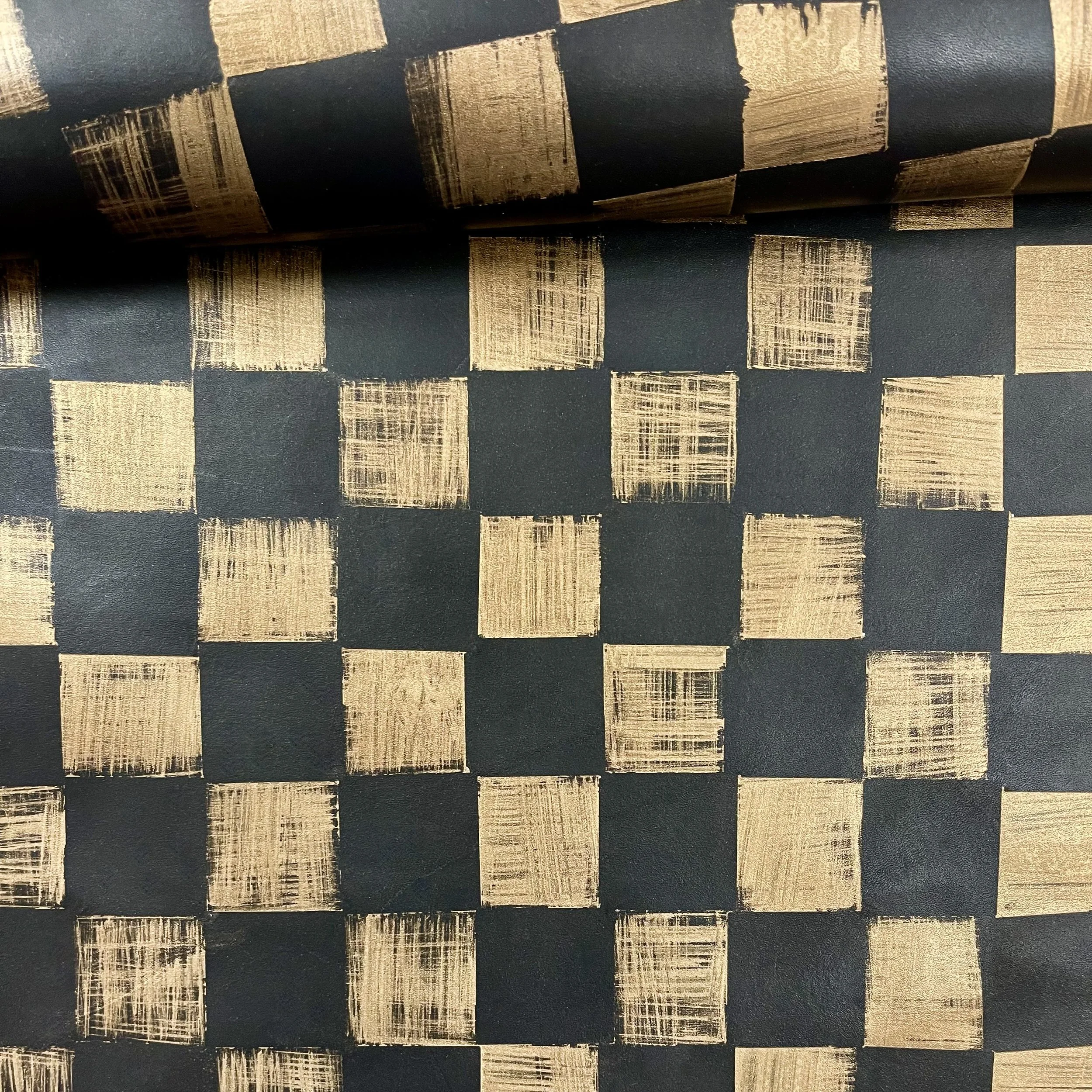 hand painted gold on Maude leather in color licorice