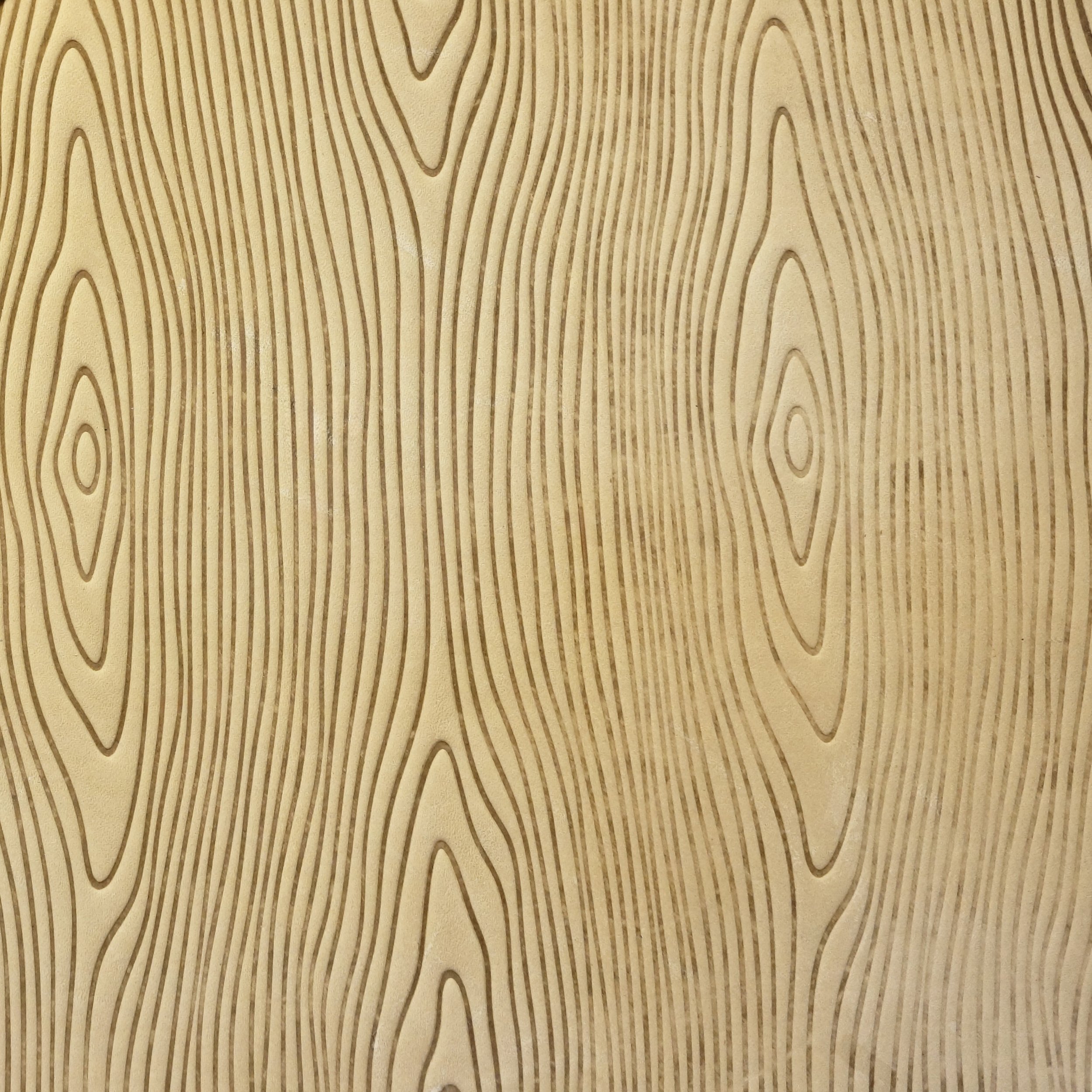 ON NATURAL UNFINISHED VEGETABLE TANNED COWHIDE