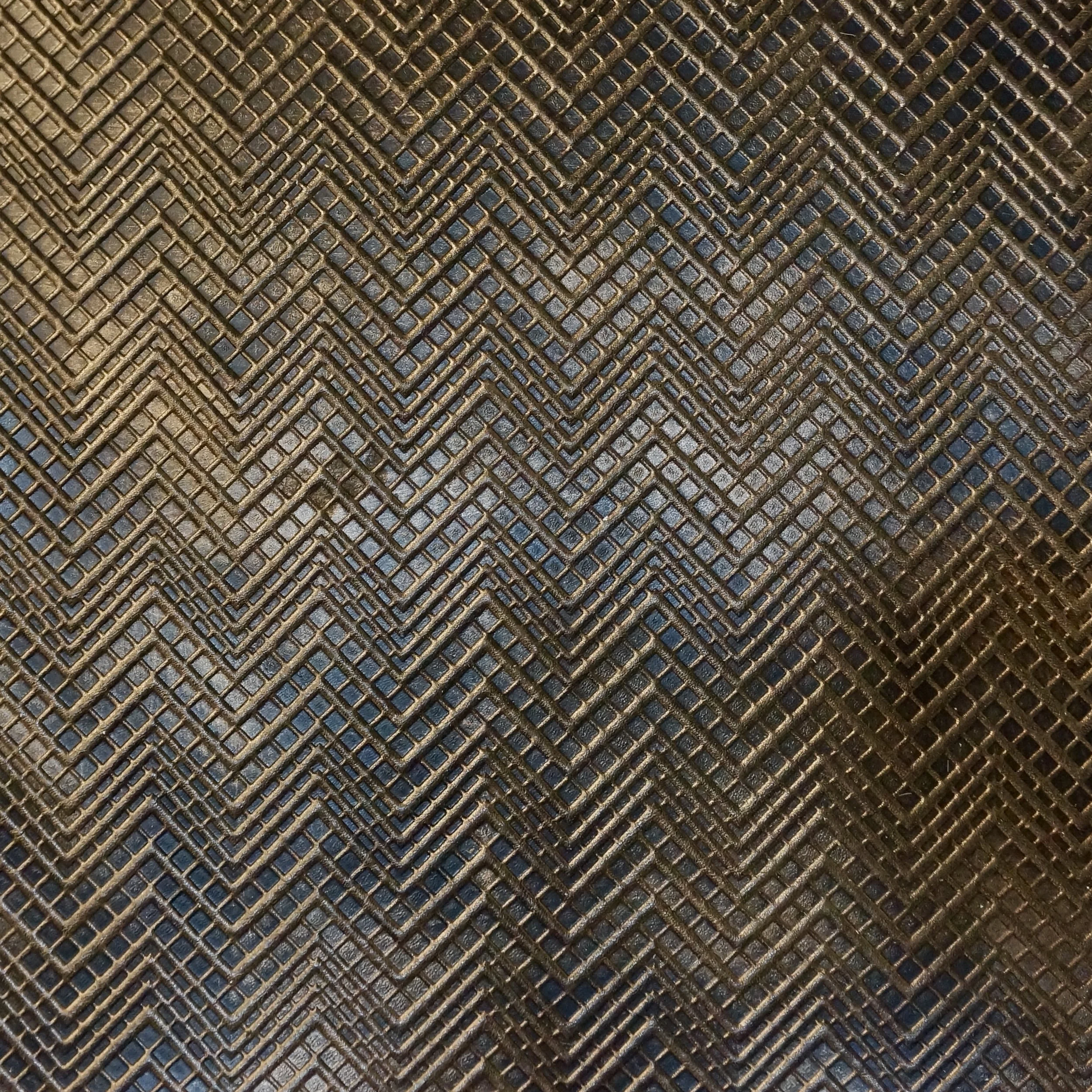 DEBOSSED ON MAUDE LEATHER IN COLOR LICORICE WITH BRONZE TIPPING