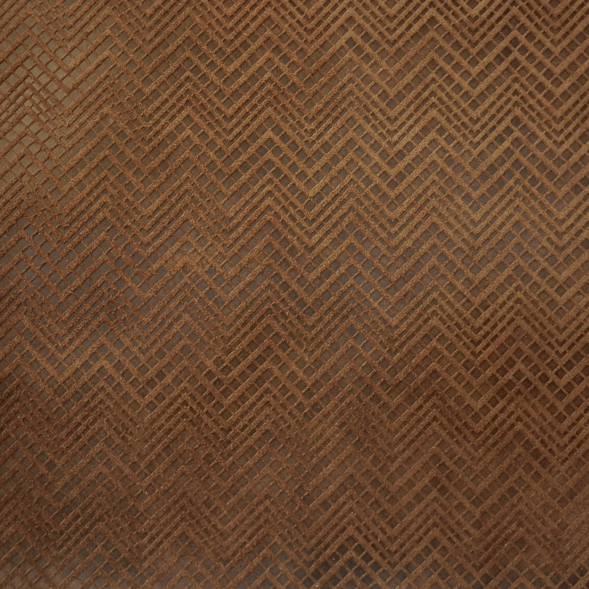 DEBOSSED ON RUTHERFORD SUEDE IN COLOR GINGER