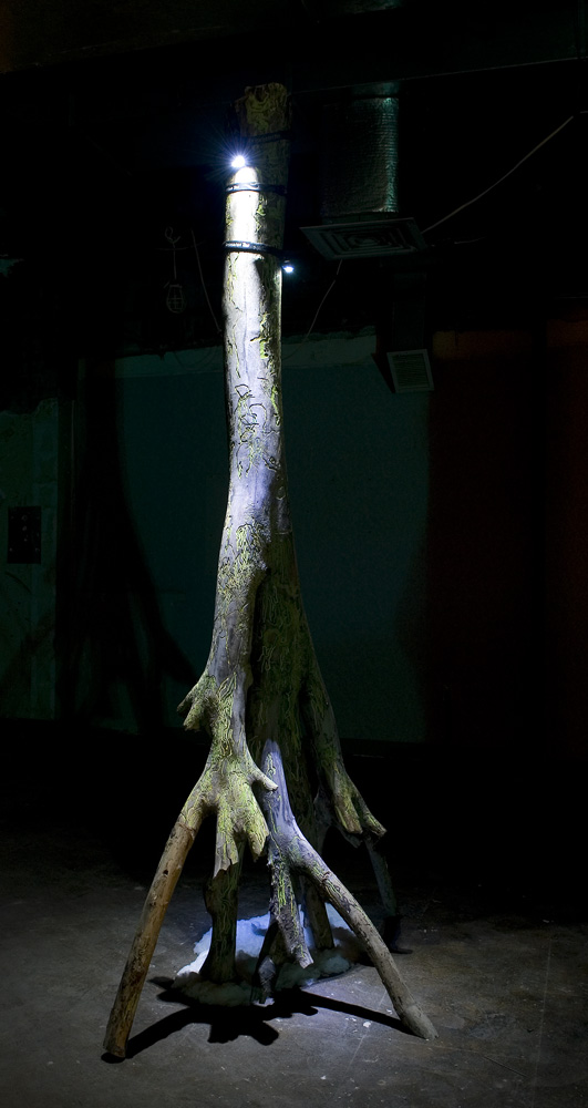   The Hippie  , 2008, 9’X3’X3’, elm tree, color pencil, artificial snow, head lamps     