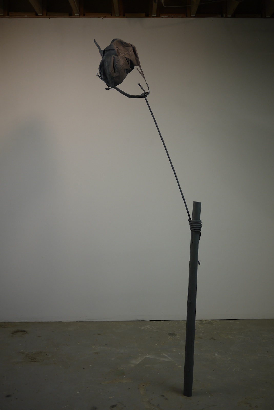   Time Alone, 2014, 106"x22"x4'' , wood, steel, backpack, rope, paint  