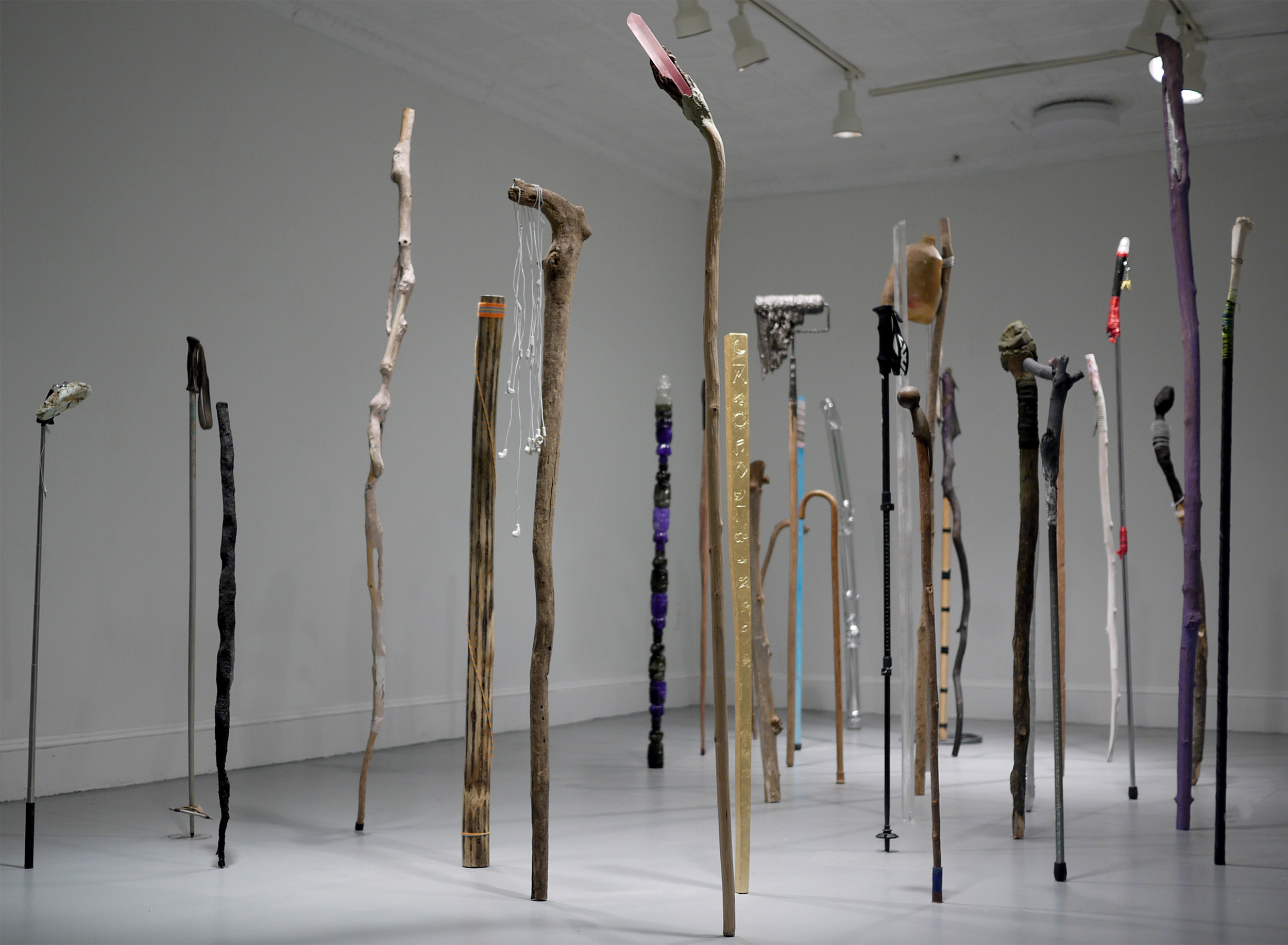 Drifter History, 2015, dimensions variable, found and fabricated walking sticks
