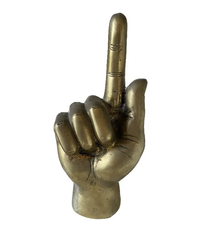 solid brass hand.jpeg