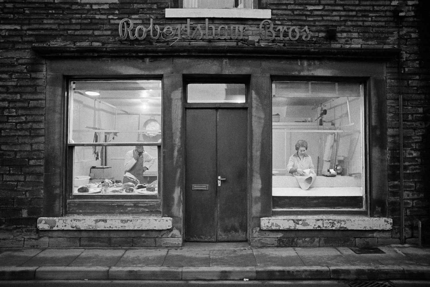 Great Britain, Yorkshire Mytholmroyd (Butchers' shop), 1977 gelatin silver print (printed 2010), 20.5 x 40 cm uneditioned