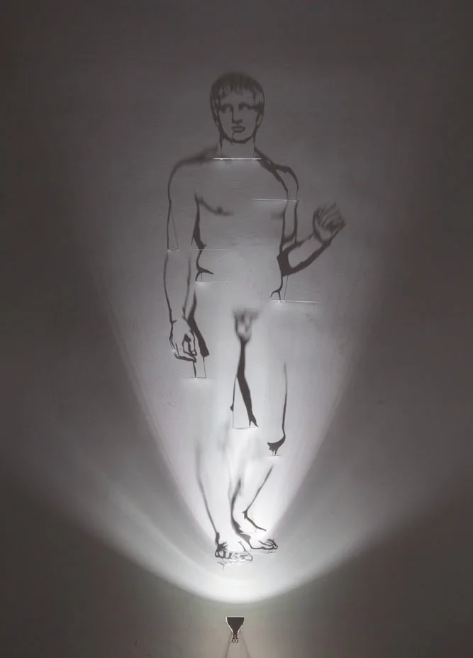 Doriforo , 2018, brass painted white, halogen lamp, shadows, image cm 230x100 cm 