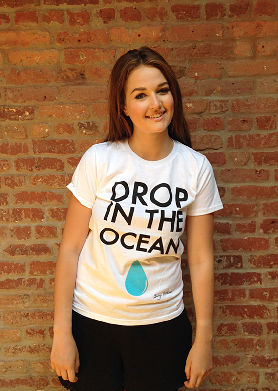  Riley wearing Oliver Proudlock's 'Drop in the Ocean' designer tee.