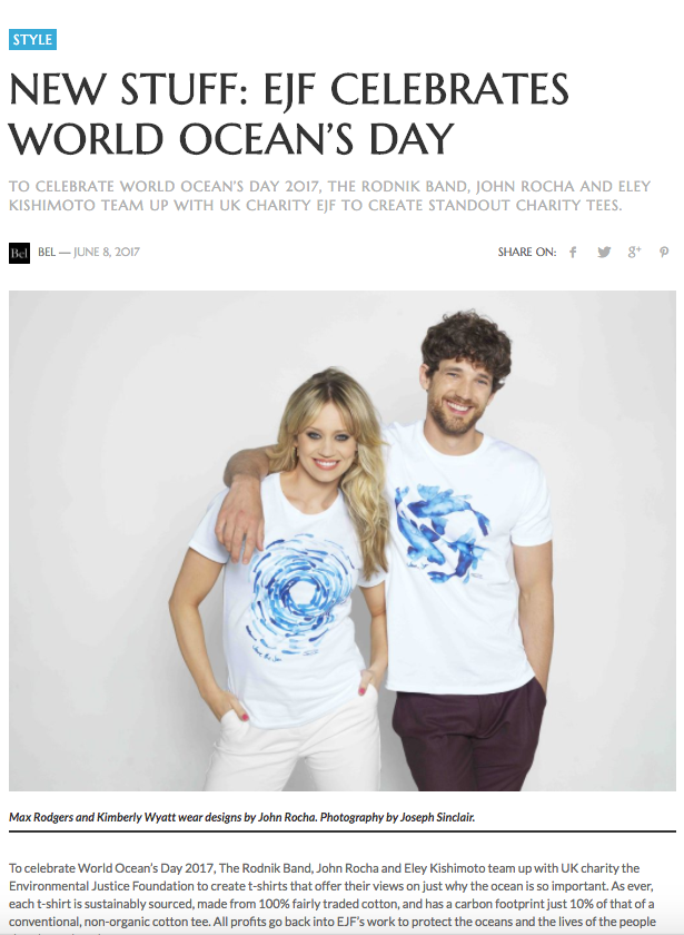 A man and woman wearing white t-shirts with blue ocean-themed designs for World Ocean's Day