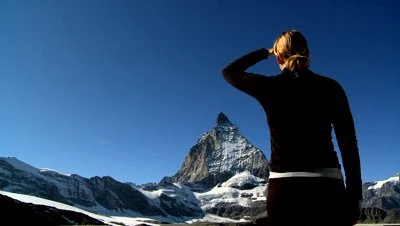 young-woman-climbing-to-the-mountain.jpg