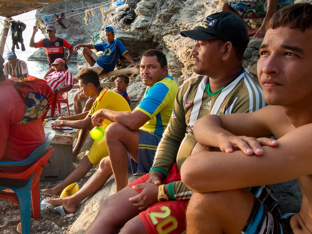 There are often long waits between pulling in the nets. In the meantime, the men enjoy each other's company in the afternoon sun. In this series, I photographed the daily happenings of a group of fishermen in the small town of Taganga, on the northern coast of Colombia. They use a simple yet effective method, common of indigenous groups, that has been passed down through generations. Their connection to the sea and their commitment to this way of life persists despite the amassing threats of pollution and over-fishing by commercial enterprises.