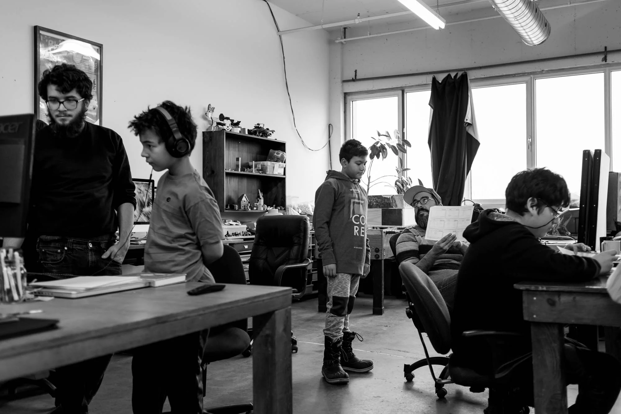 Participants work with program facilitators to develop their ideas. Youth on the autism spectrum are encouraged to express themselves through animation at Saturday morning cartoon club. In this photo essay I show youth on the autism spectrum engaged in programming at Spectrum Productions. Spectrum Productions provides an opportunity for youth to gather together - they imagine, story board, write scripts, draw and create video while interacting with each other and with staff, something that is not always an easy task. 