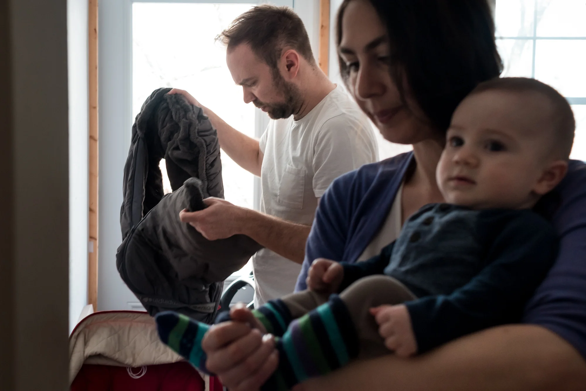 In this series, I reflect on traditional parenting roles by turning my lens on a new family. Sarah and Fred had their first baby, Elliot, four months ago. They invited me into their home to photograph them as they went about their day and we spoke about parenthood candidly. For them, parenting is something they had been longing for for some time. Although there are challenges, they have embraced their new life as a family with full hearts.