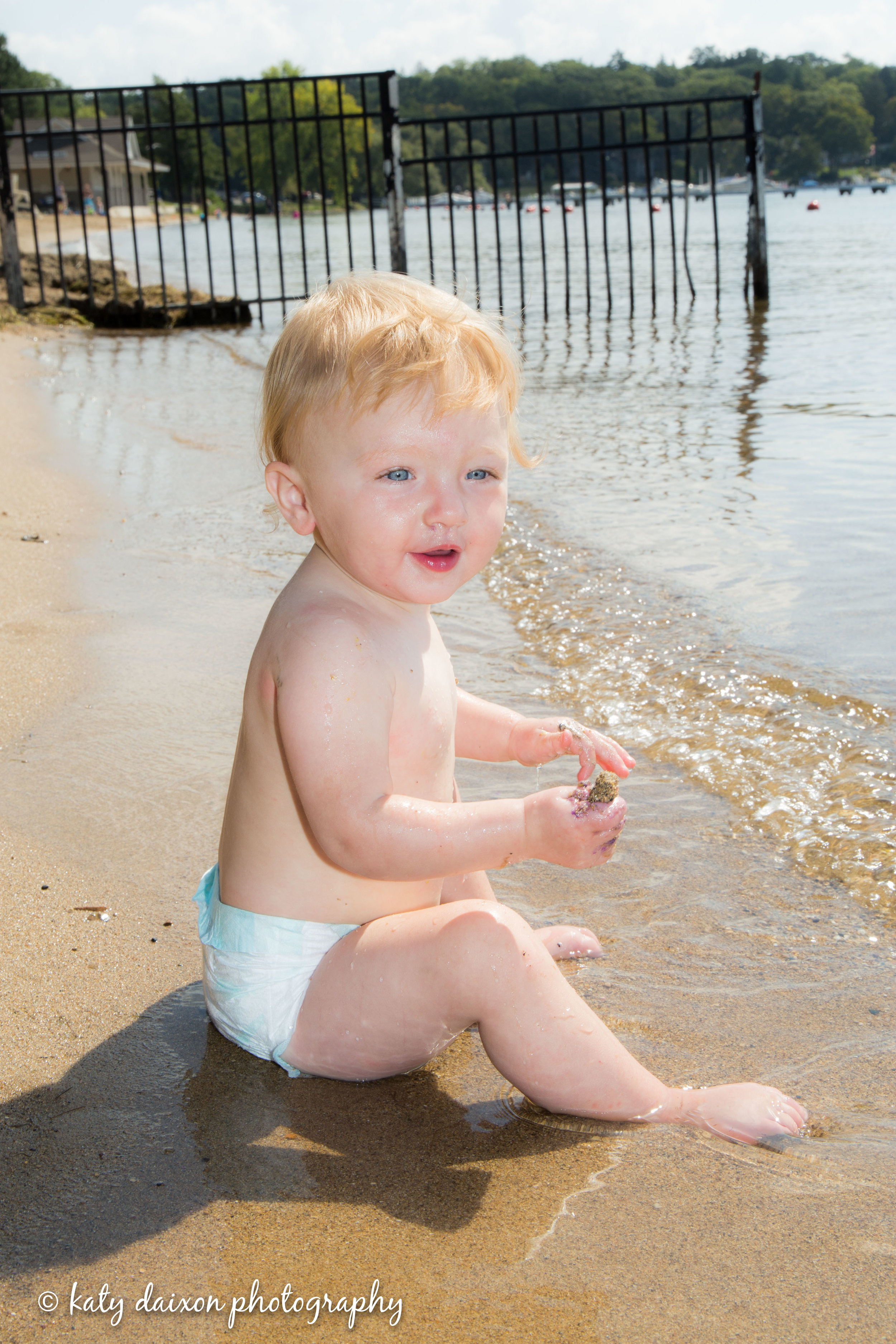  And we end the afternoon with a little dip in the lake to clean off the frosting and play with sand! 1yr portraits a success! 