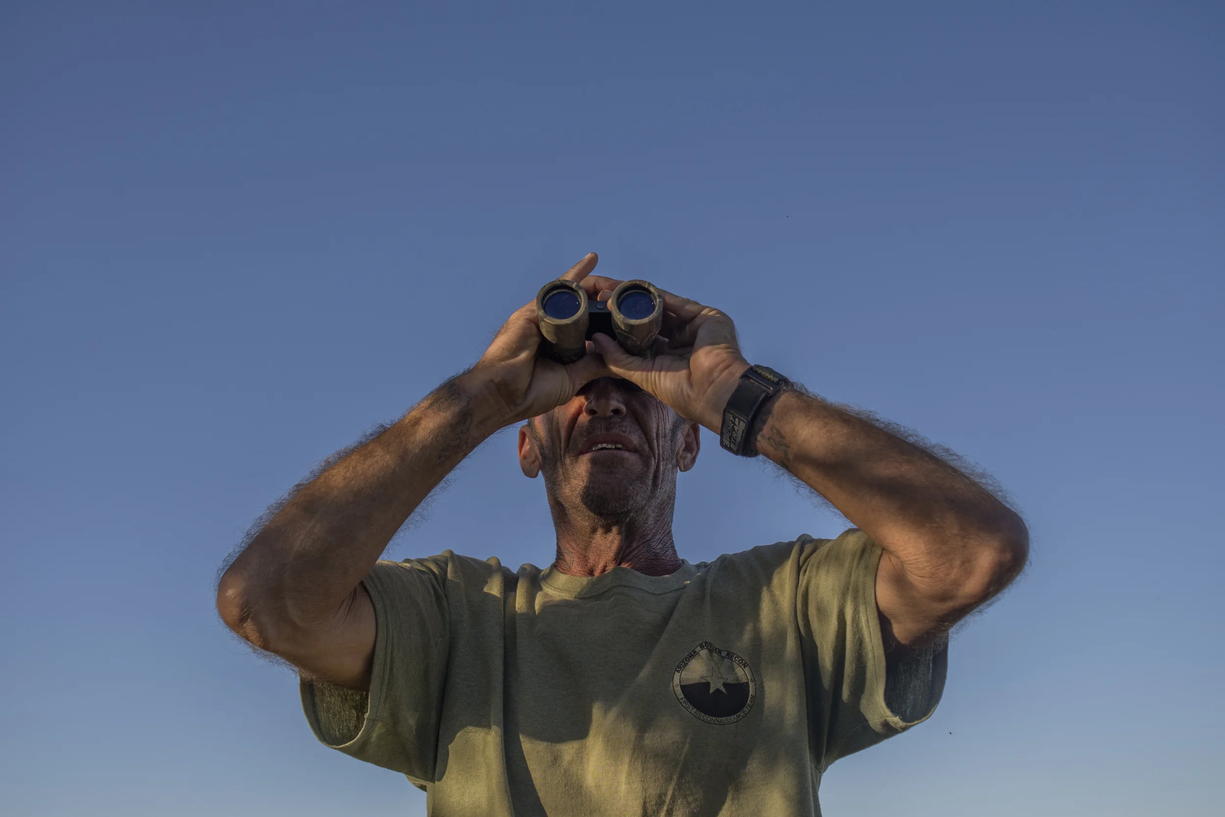  OCTOBER 5 2014- &nbsp;"Nailer", eyes the hills with binoculars in the early morning. 