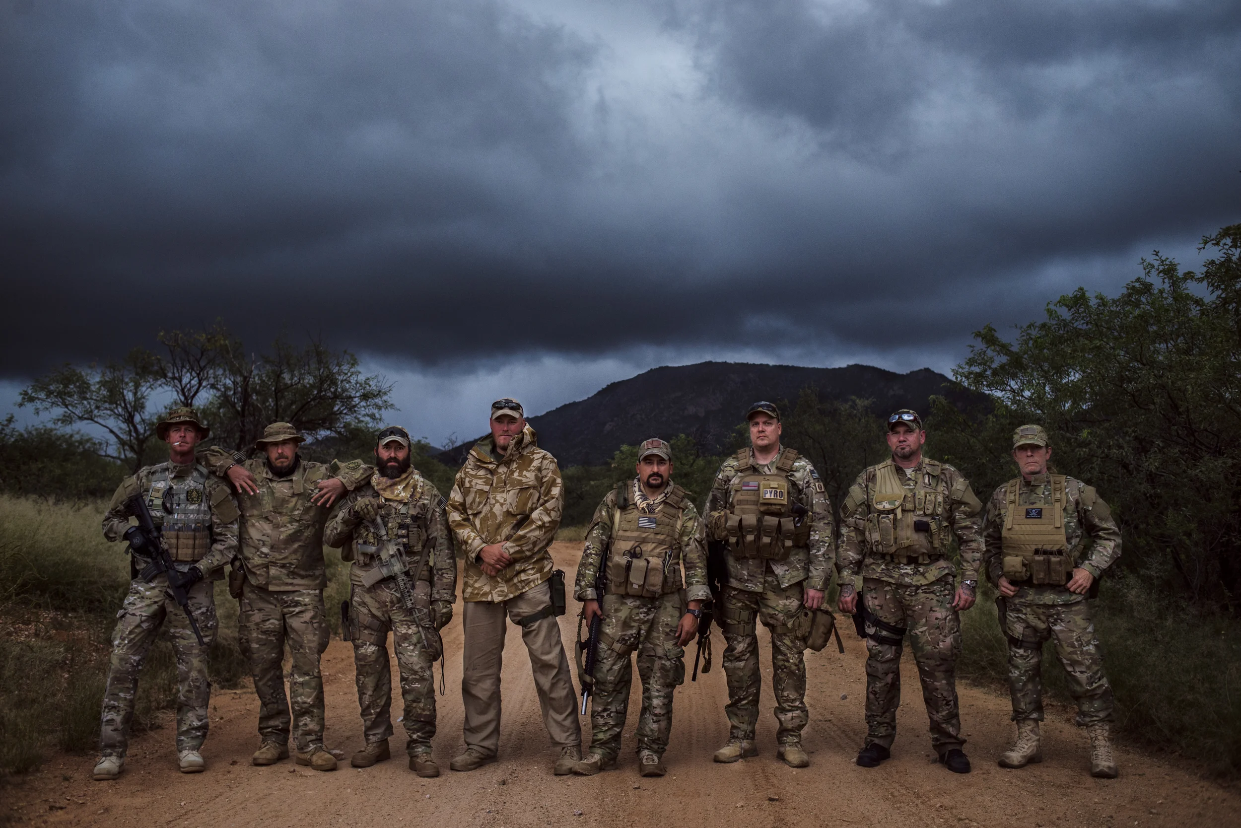  OCTOBER 7 2014 SASABE ARIZONA- The prospective members of the Arizona Border Recon take a group photo before heading back from ominous weather. &nbsp;For some in the group, it is their first time out. &nbsp;The AZBR uses this time as a vetting proce
