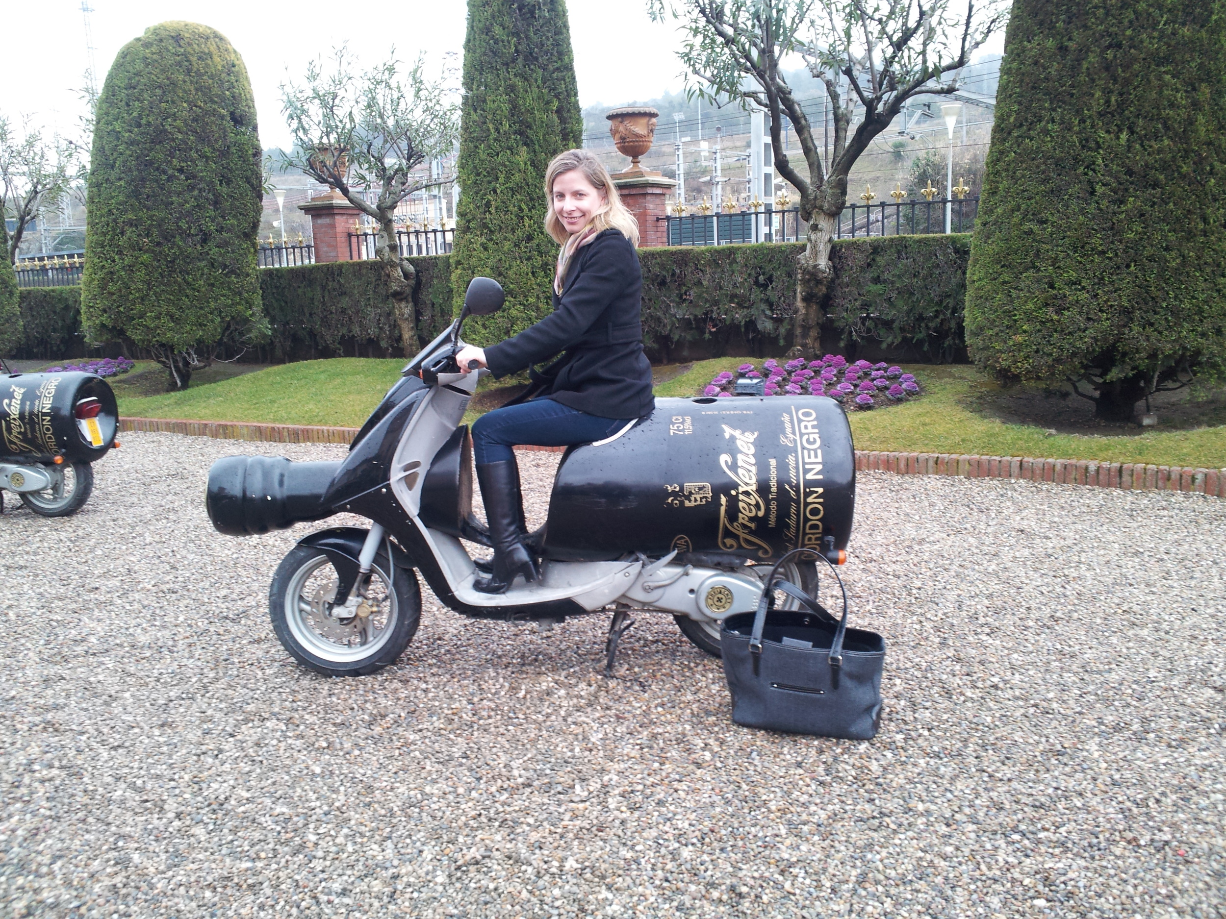 Taking the Freixenet scooter out for a ride in Penedes, Spain.