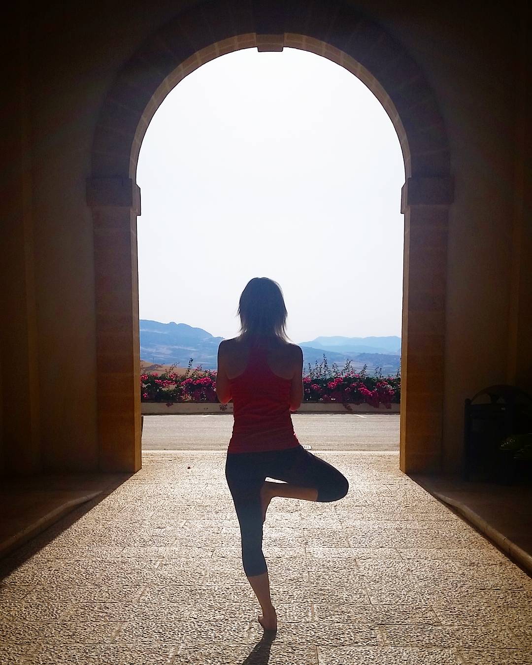 Doing morning yoga at Stemmari's estate on Sicily.