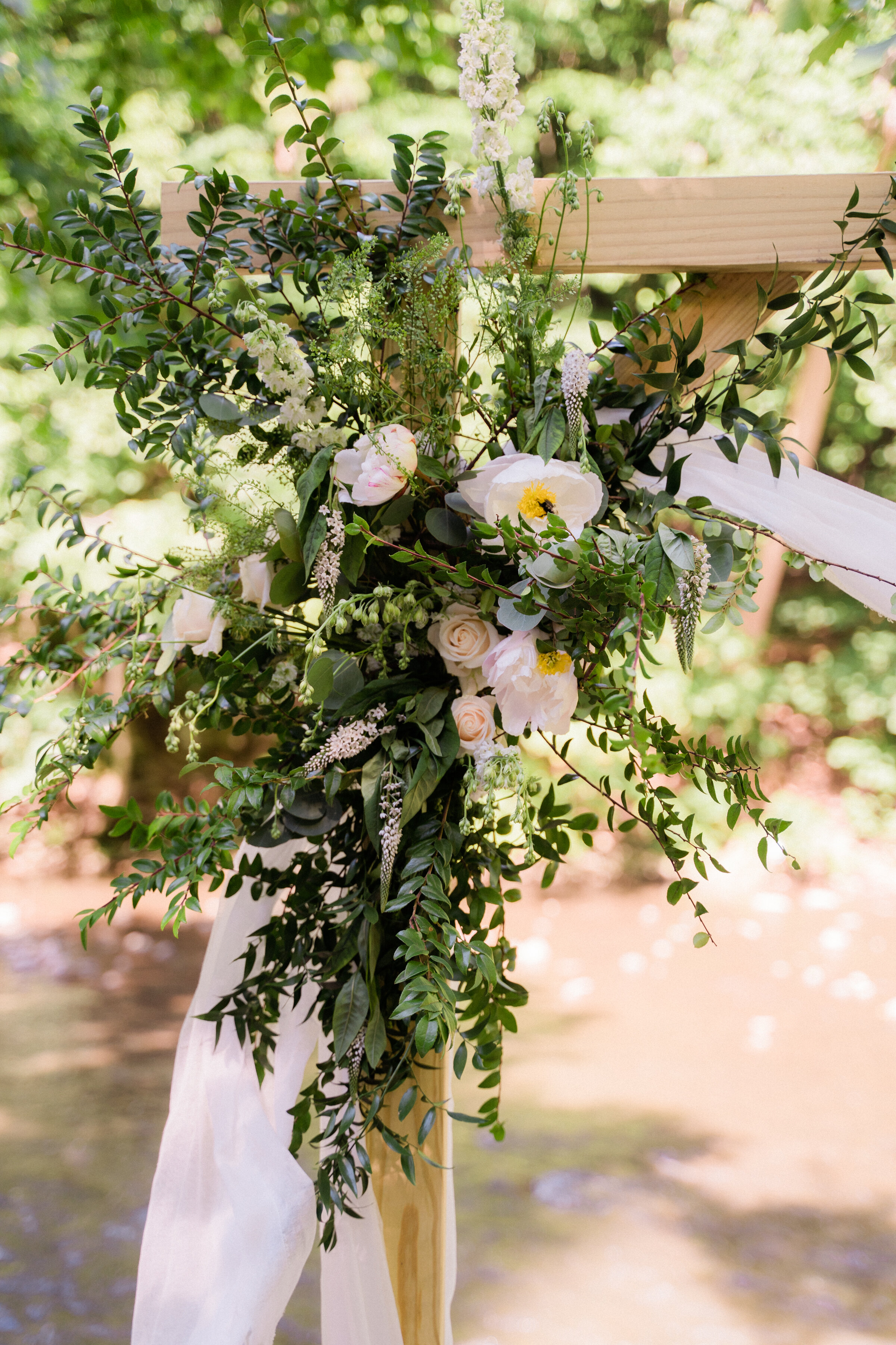 simple spring ceremony arch.jpg