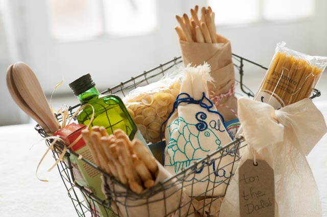 For the pasta lover, start with a wire basket and add our hand-embroidered “Cod” design of Sal del Mar. Use your imagination with filling it with such gourmet items such as a bottle of extra virgin olive oil, breadsticks, and pasta. Then just tie on a ribbon and a tag.
