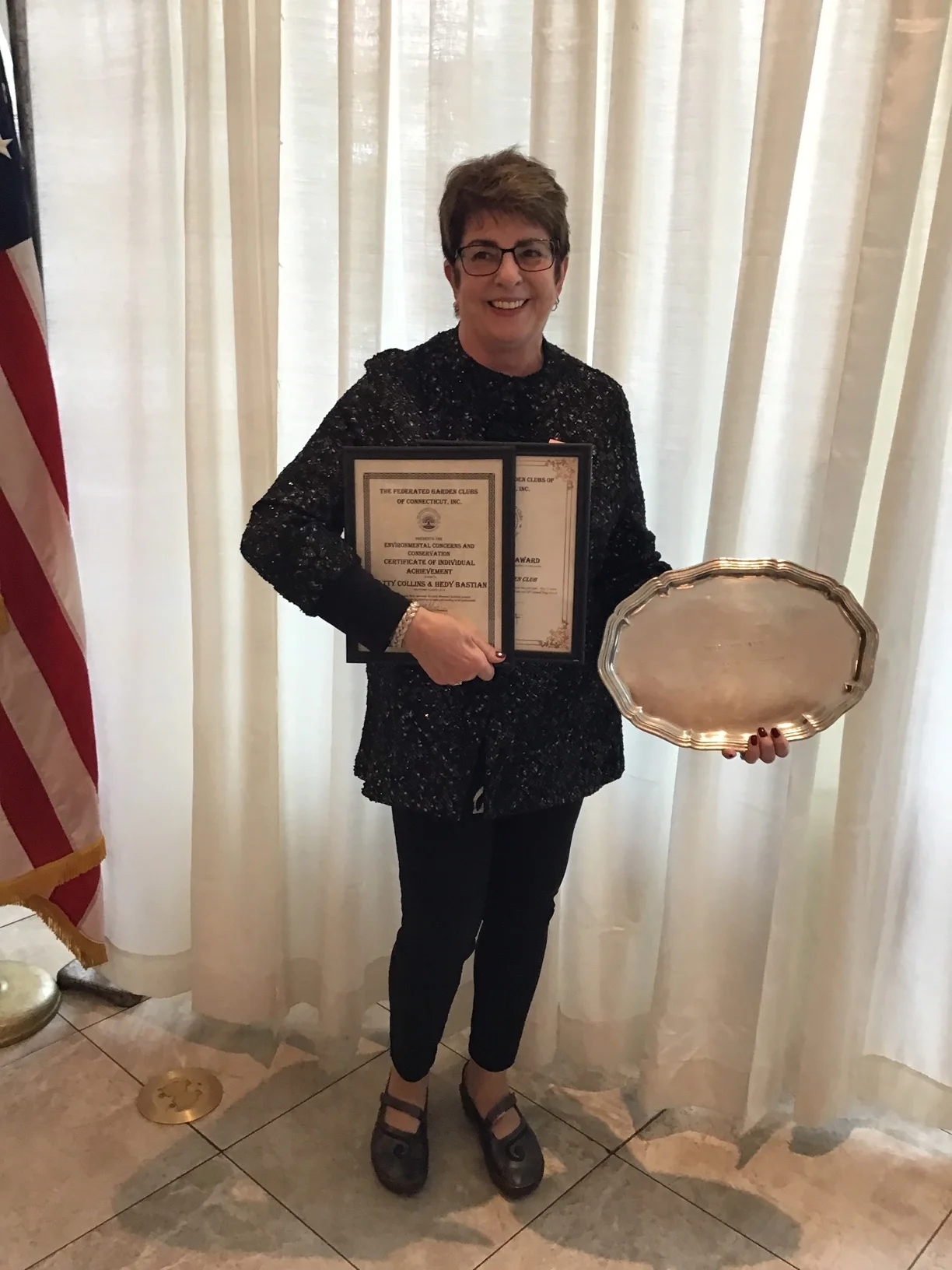 Certificates of Individual Achievement award were presented to Hedy Bastian and Patty Collins for their mini-monarch habitats. Hedy Bastian was present to accept the certificates.