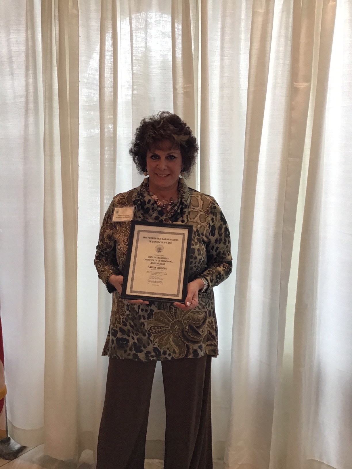 Paula Inglese received an Individual Certificate of Achievement, Civic Creativity Award, for her excellence and creativity in staging at the Breath of Spring Flower Show held in Hartford in February.