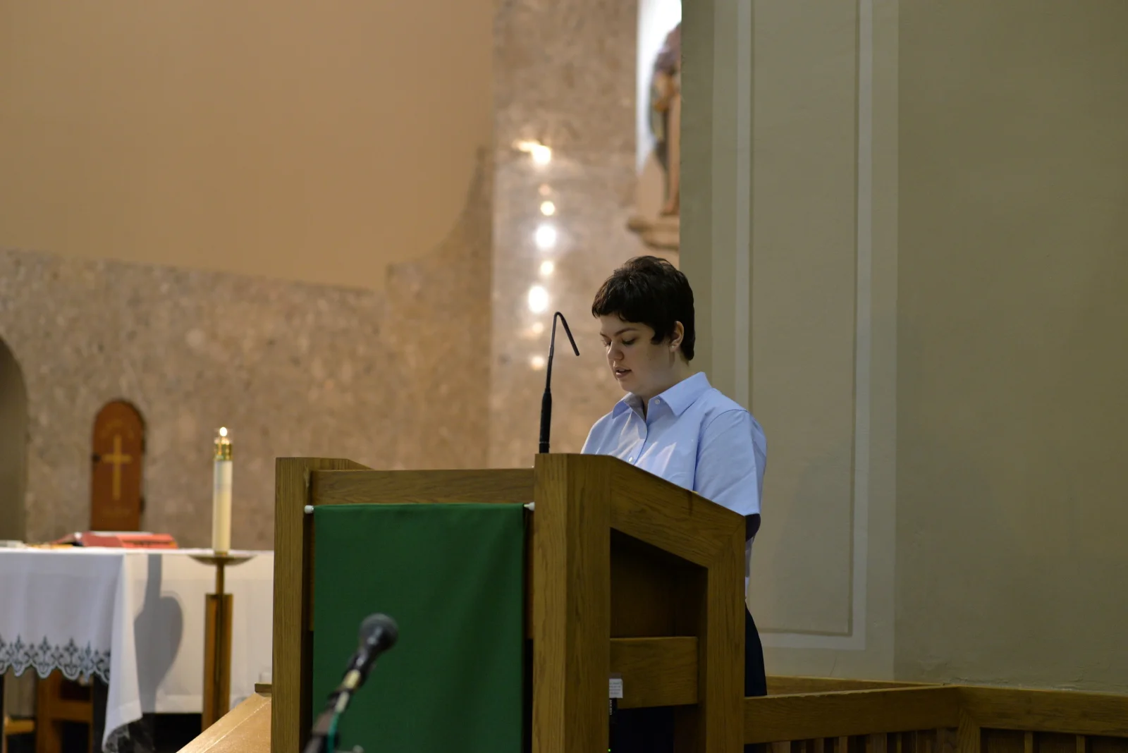 Elizabeth Reading at Mass.jpg