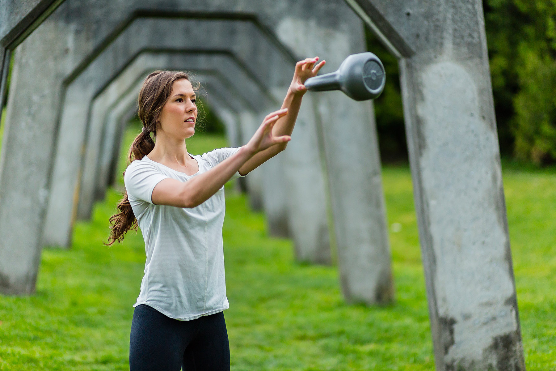  Fitness: Mary Little exercising with a kettle bell at Gas Works Park, Seattle, Washington 