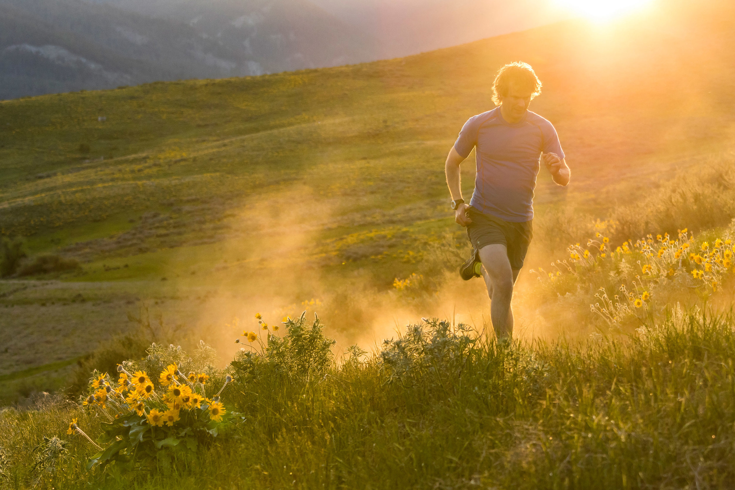  Adventure: Chris Solomon trail running on a ddry, dusty evening in the Methow Valley in spring, Washington 