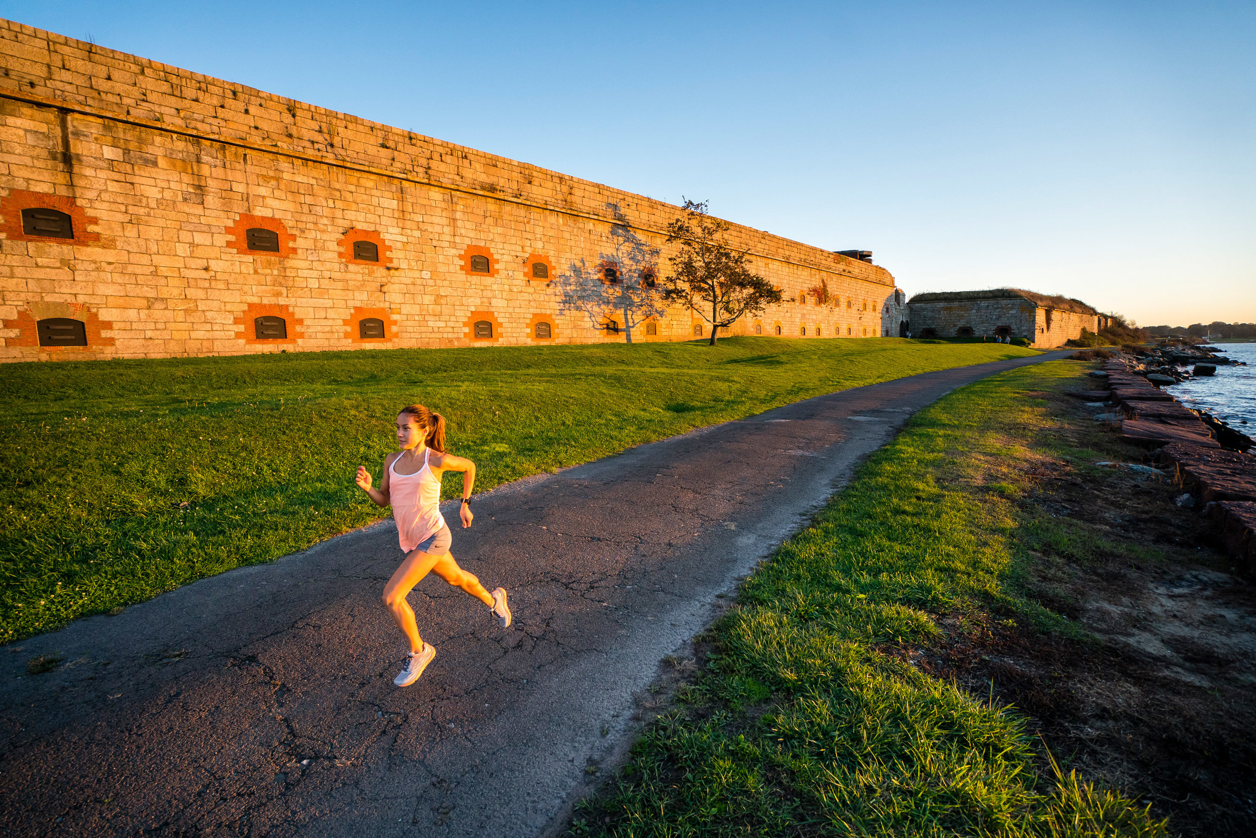  Fitness: Road running at Fort Adams at sunset, Newport, Rhode Island 