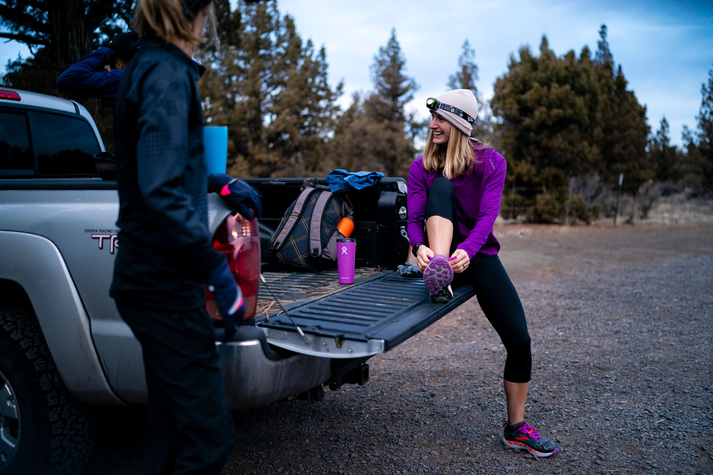  Adventure: Allison Morgan and Camelia Mayfield getting ready for a trail run in the desert near Ben, Oregon 