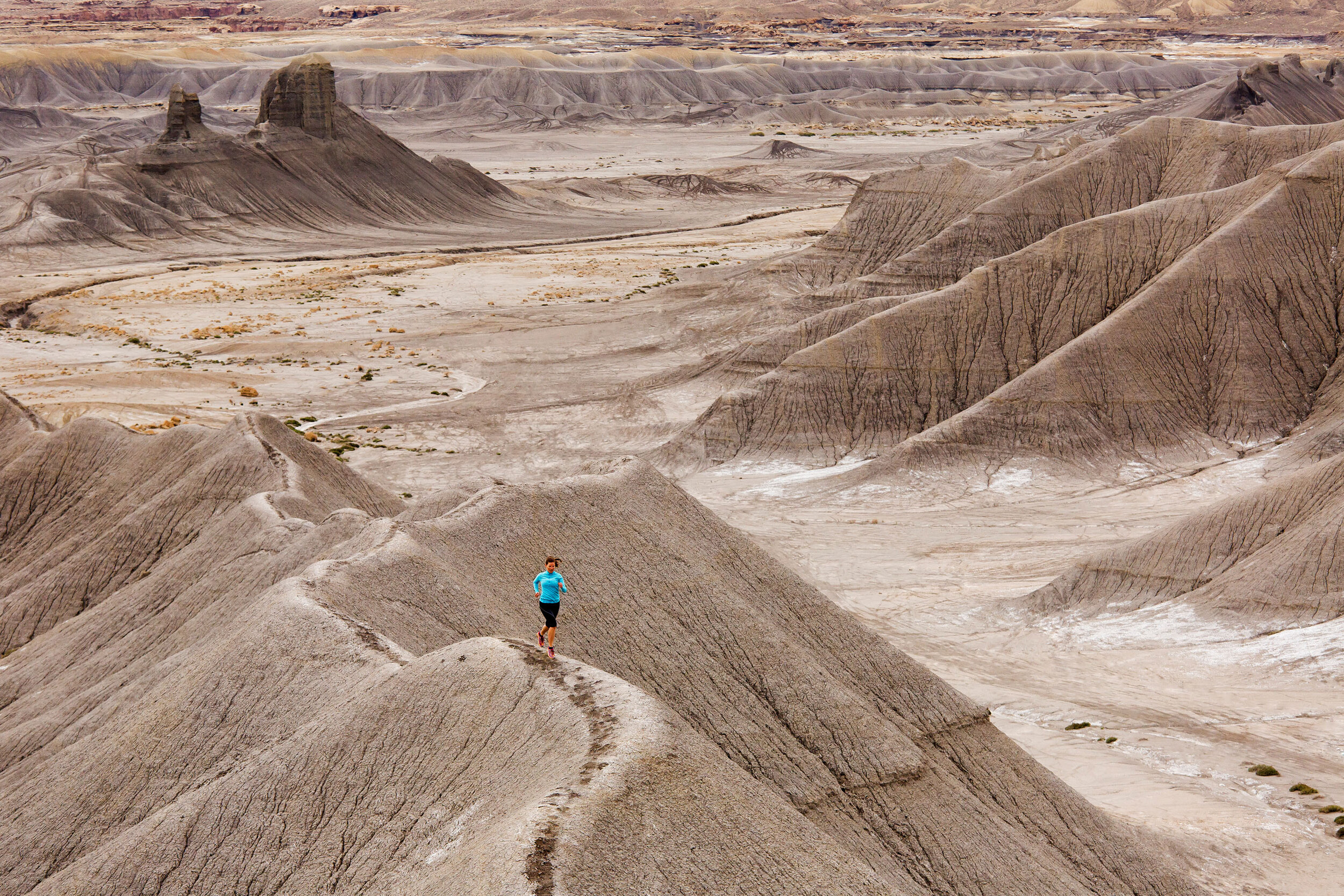  Adventure: Melissa Hagedorn trail running in the Cainville Mesa badlands, Cainville, Utah 