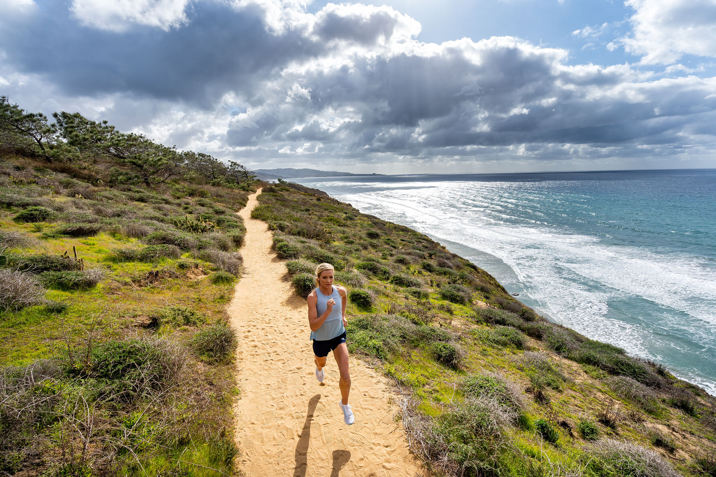  Adventure: Olympic steeplechase athlete Emma Coburn trail running at Torrey Pines State Park, San Diego, California 