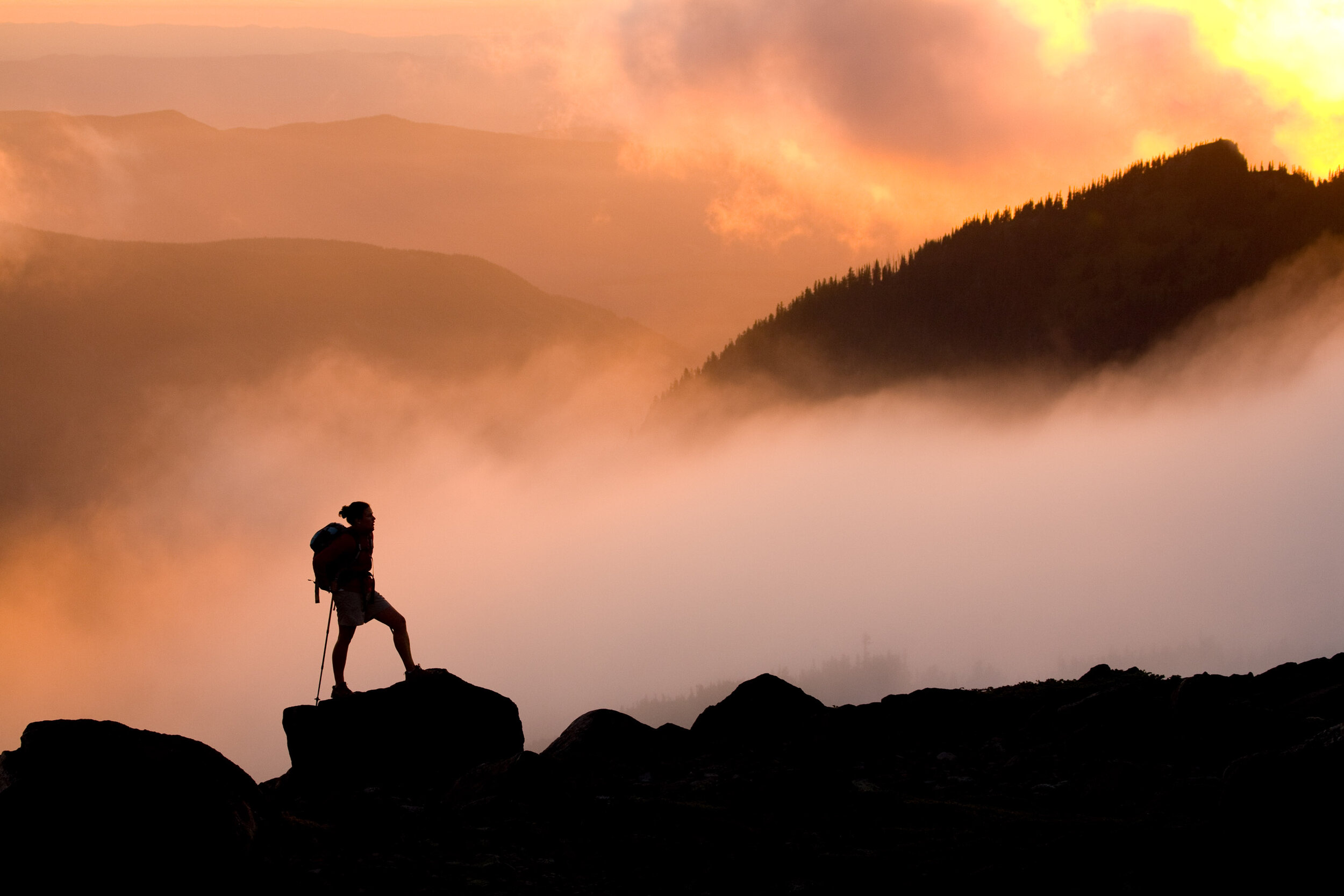  Adventure: Libby Waldo hiking at sunset in Spray Park, Mt. Rainier National Park 