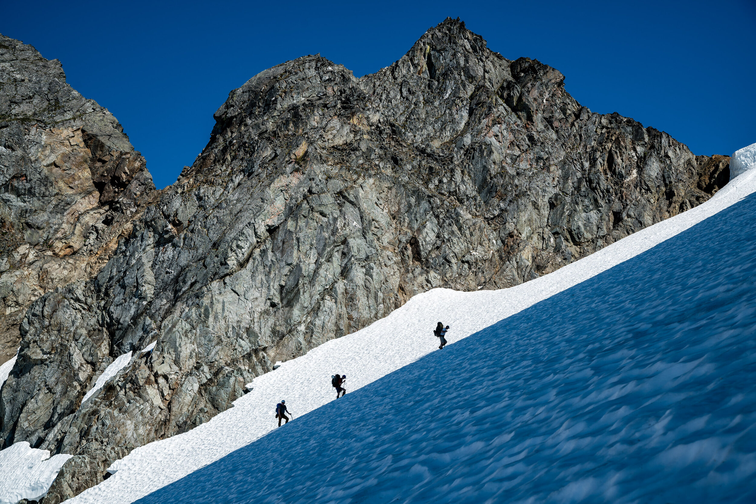  Adventure: A group of climbers ascending the Cache glacier on the Ptarmigan Traverse, North Cascades, Washington 