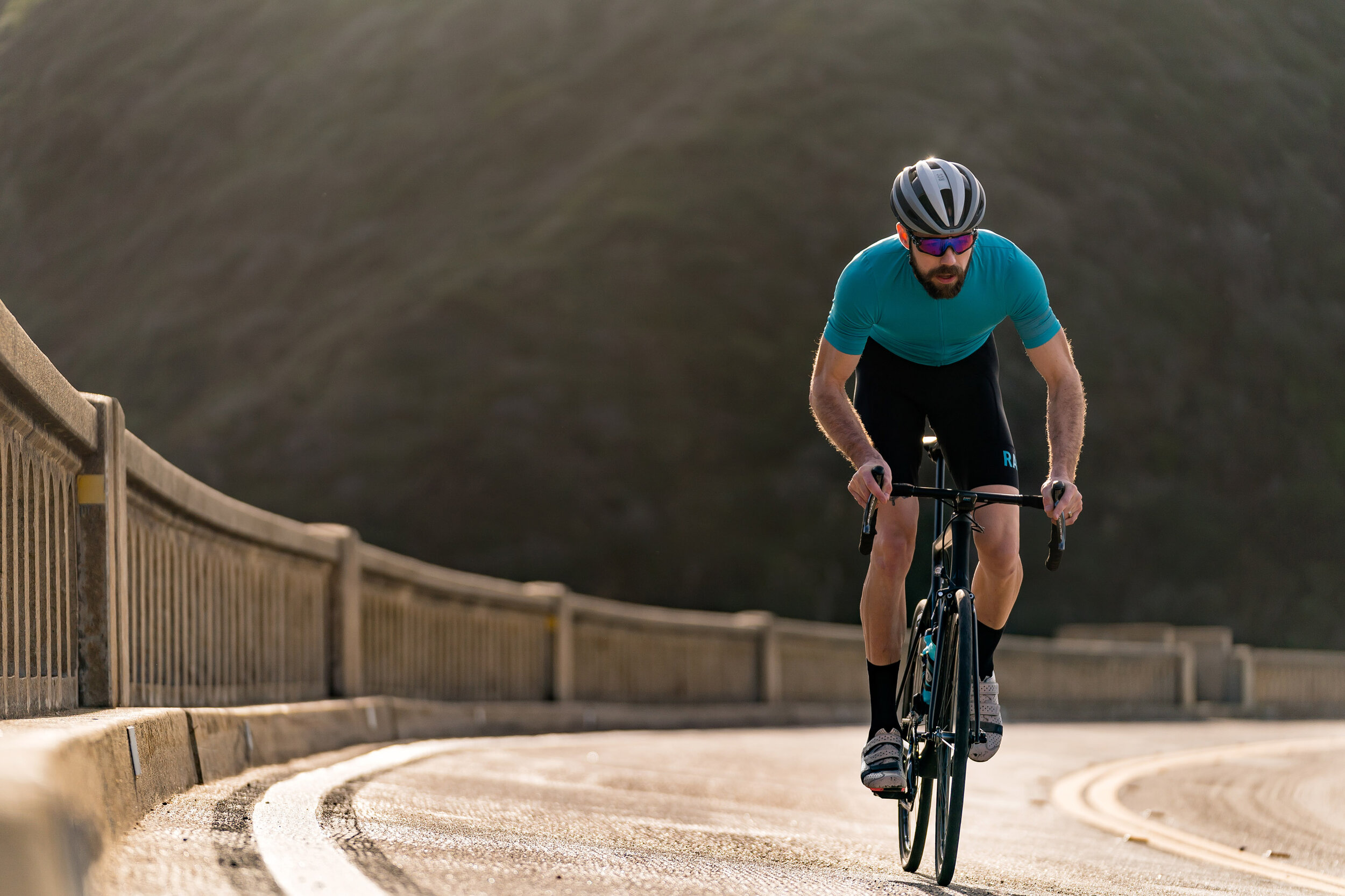  Adventure: Tyler Smith road biking across the Bixby Creek Bridge, Big Sur Coast, California 
