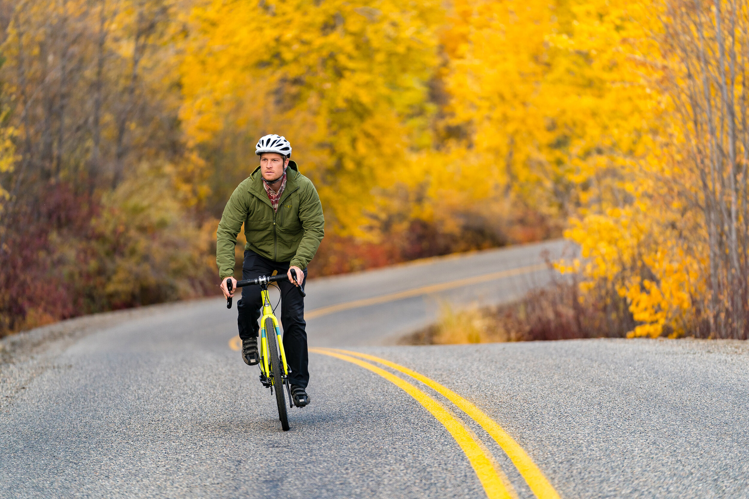  Lifestyle: Sam Olive bike riding in the Methow Valley in autumn, Winthrop, Washington 