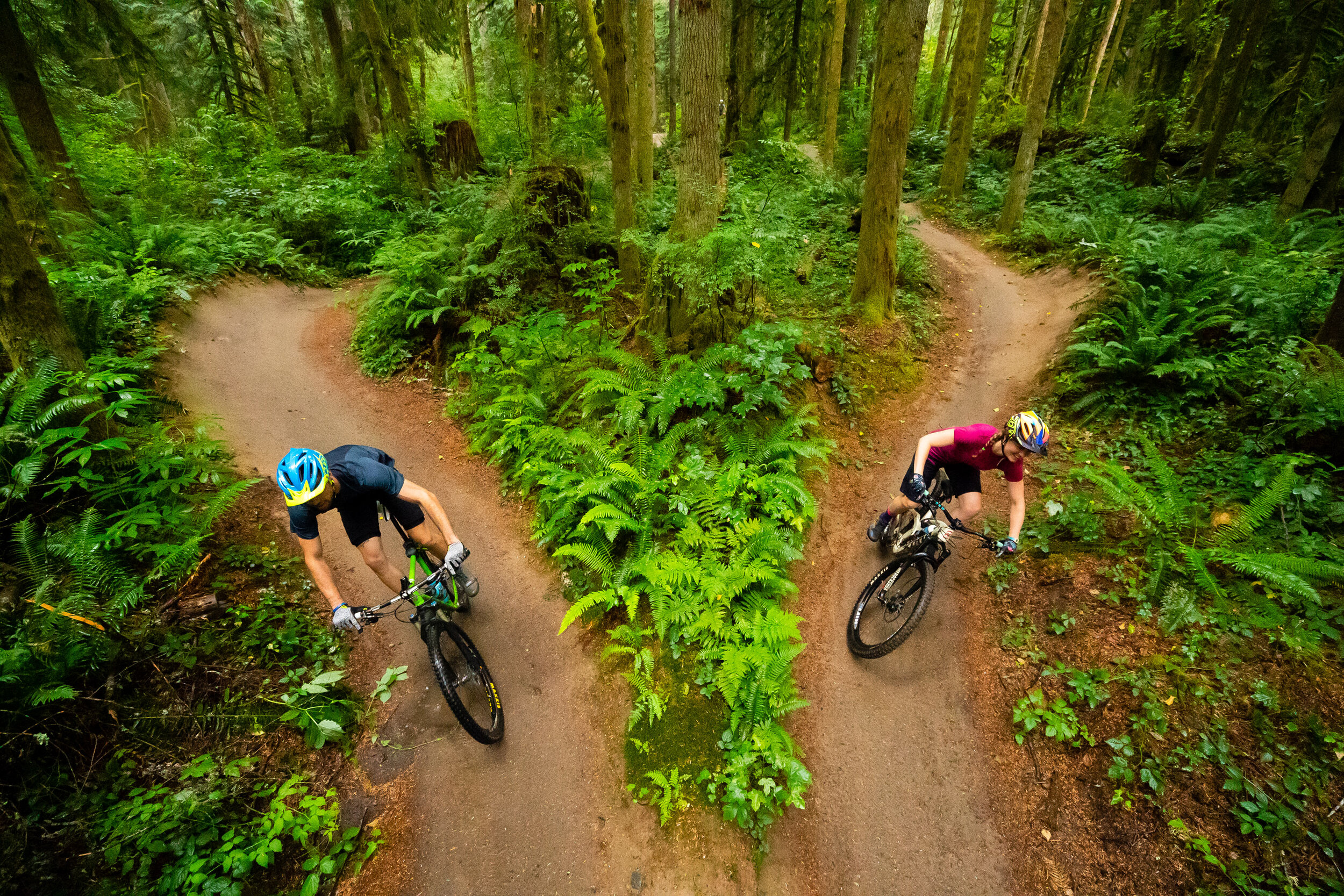  Adventure: Tyler Smith and Delia Massey mountain biking at Duthie Hill Mountain Bike Park, Issaquah, Washington 
