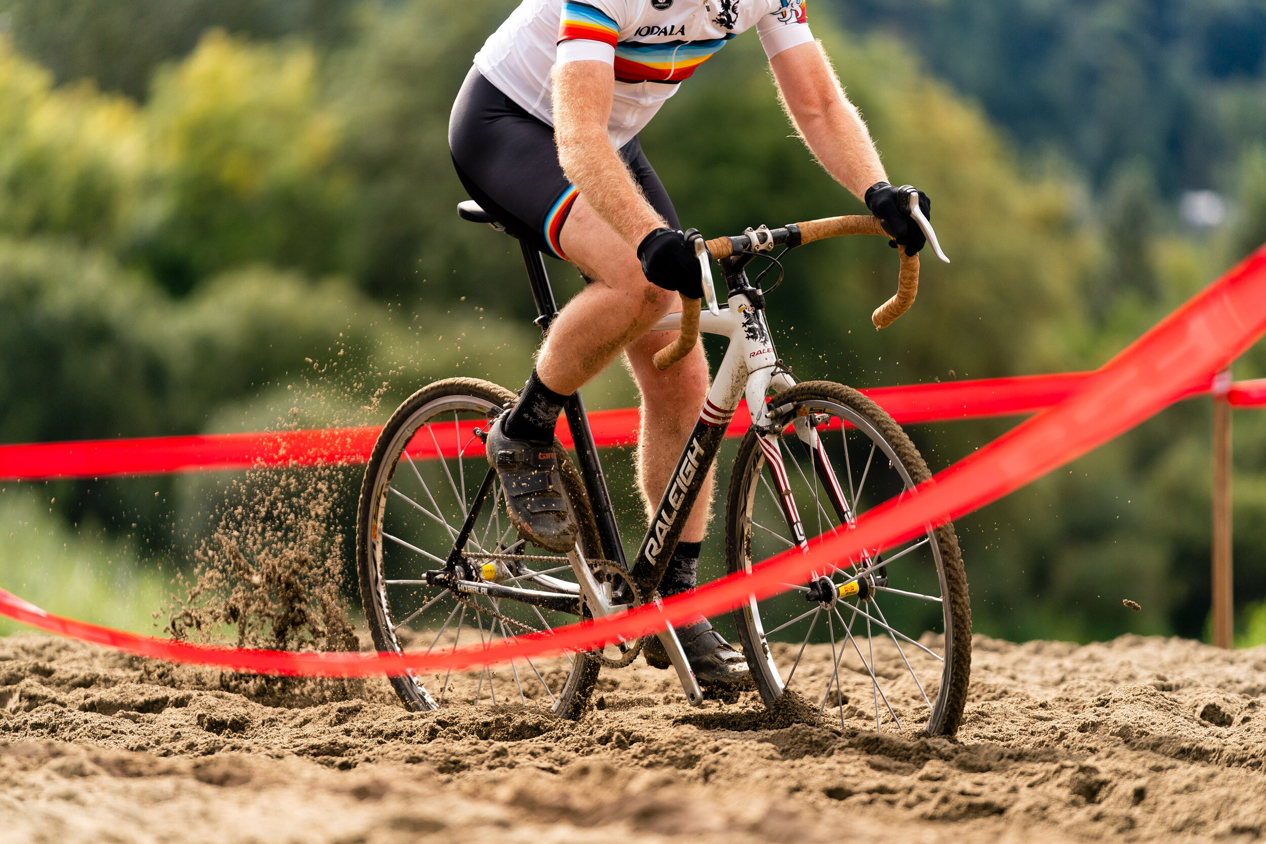  Competition: A cyclocross racer riding through a deep sand section during a race at Lake Sammamish State Park 