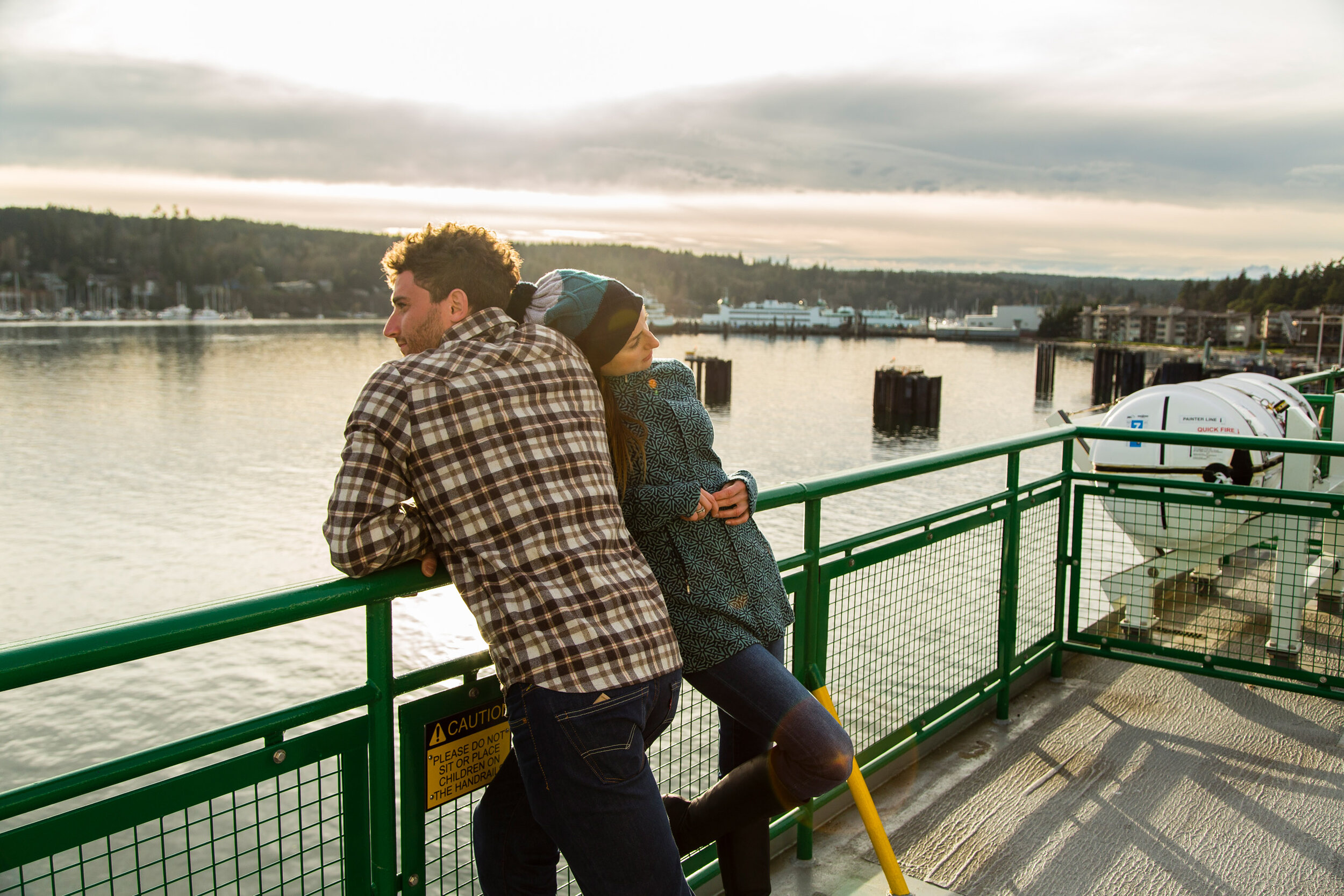  Lifestyle: Alexi Aizenman and Elena Zinkov riding a Washington State Ferry in winter, Bainbridge Island, Washington 