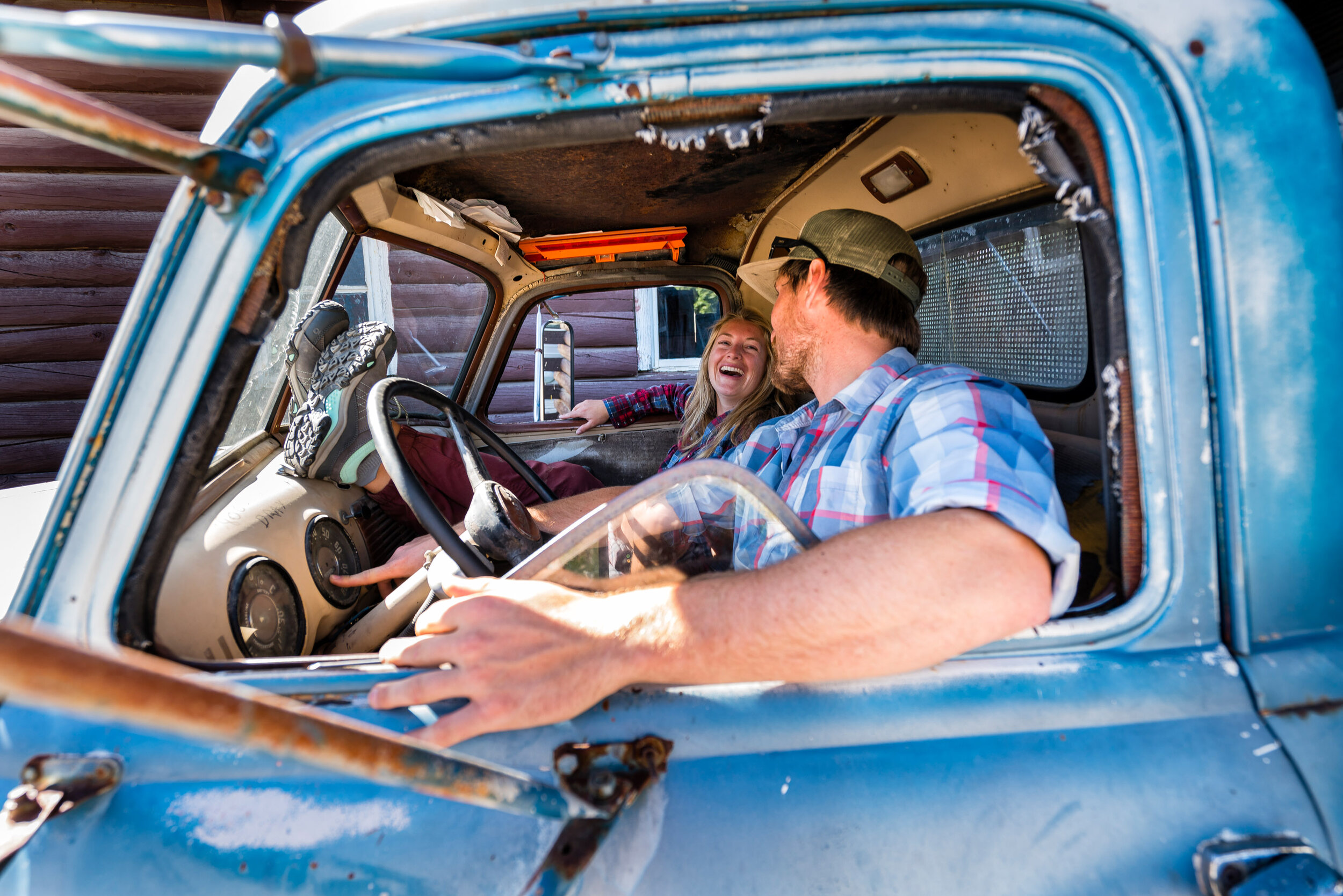  Lifestyle: Courtney Hamilton and Logan Frederickson hanging out in an old pickup truck near Ketchum, Idaho 