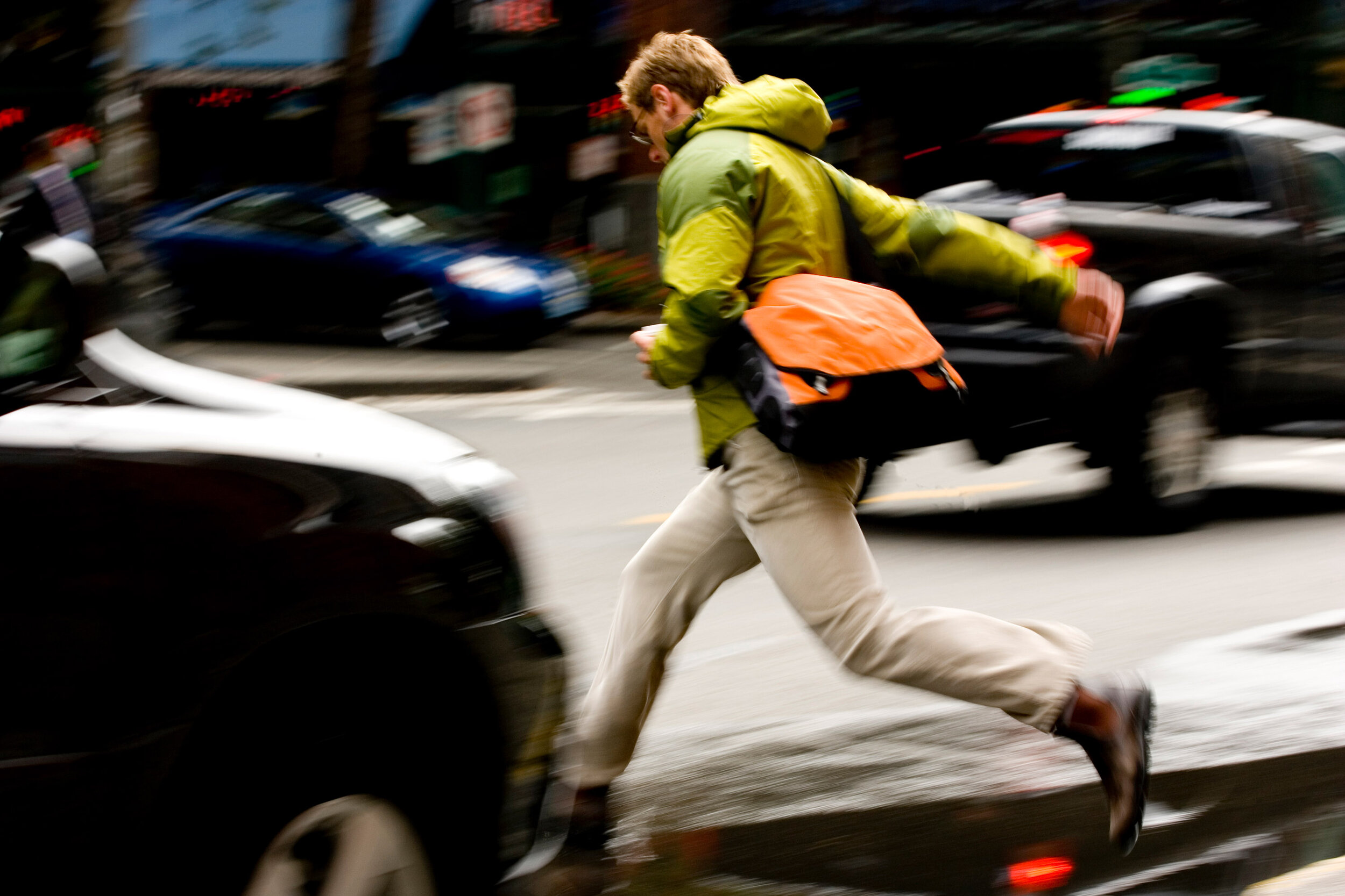  Lifestyle: Chris Solomon walking through a wet Pioneer Square, Seattle 